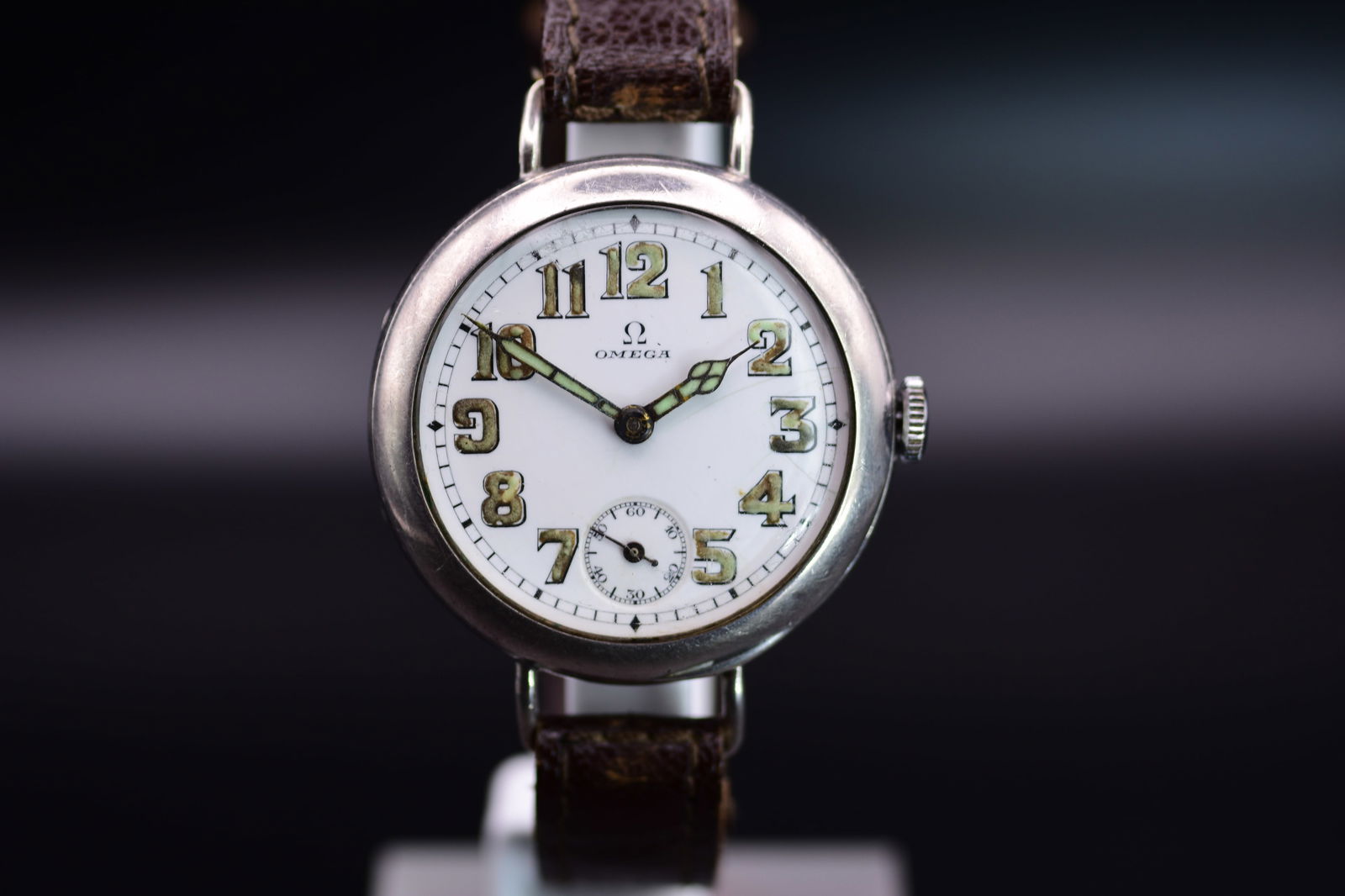 Omega Military Trench Watch 1916 WWI Sterling Silver Radium Dial Historically Significant: 1916BThe Omega Trench Watch is a historically significant and highly collectible timepiece that represents the early 20th century?s military watchmaking heritage. Produced by the Swiss watchmaker Omeg