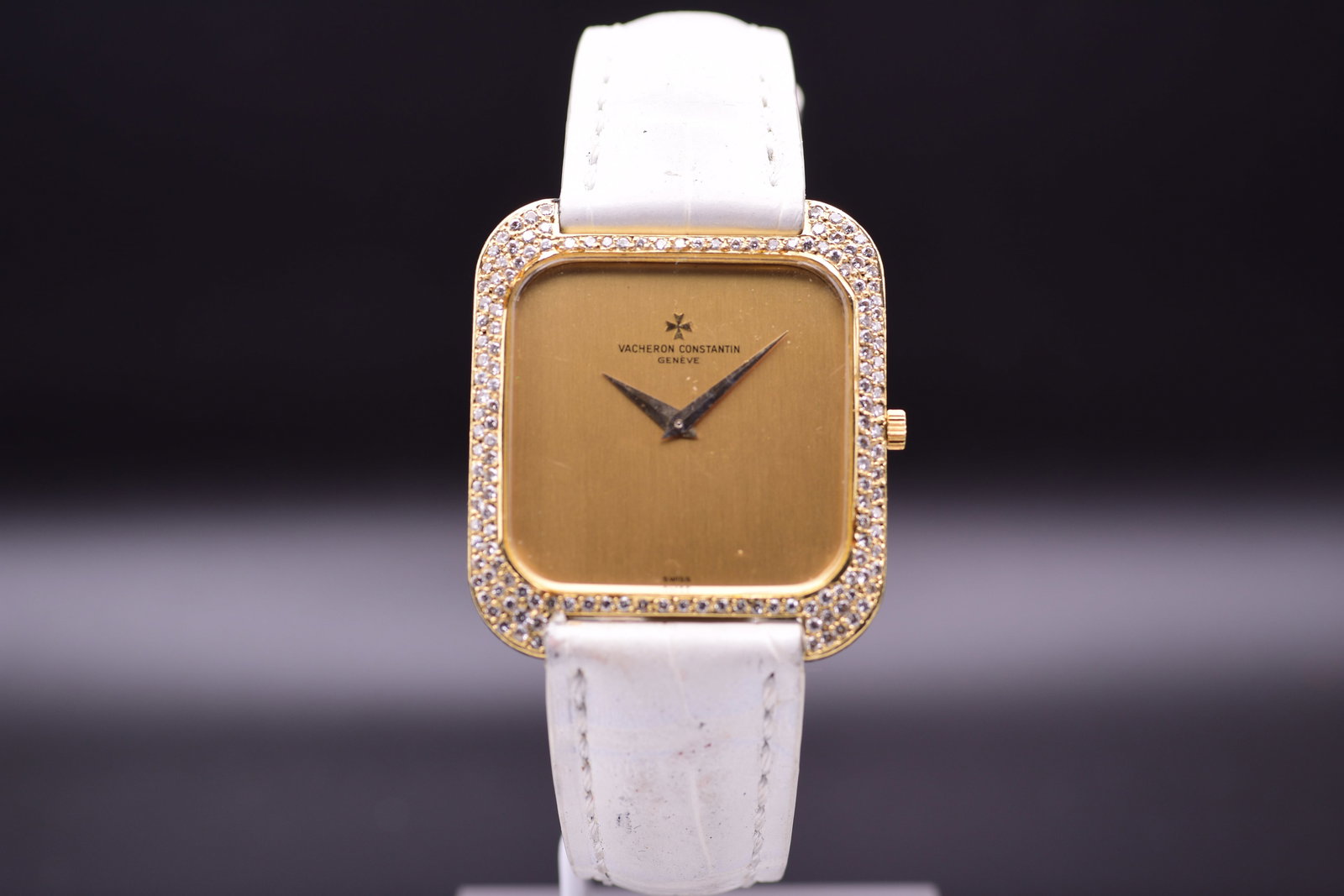 Vacheron Constantin 18k Gold 'Jumbo' Square Wristwatch with diamond-set bezel C. 1970's Including Bo: C. 1970'sABVacheron Constantin, reference model likely?33512, presents in an elegant square case crafted from 18k yellow gold. The sophisticated design is elevated by a stunning, factory-set diamond