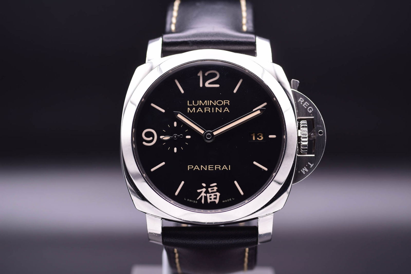 Panerai A Limited Edition Luminor Marina 1950 3-Days "Fu" Special Edition, Ref PAM 498: C. 2012AA Panerai Luminor Marina 1950 3-Days "Fu" Special Edition (Reference PAM 498), presents a compelling fusion of robust Italian design and profound Chinese symbolism. Crafted in a polished 44mm