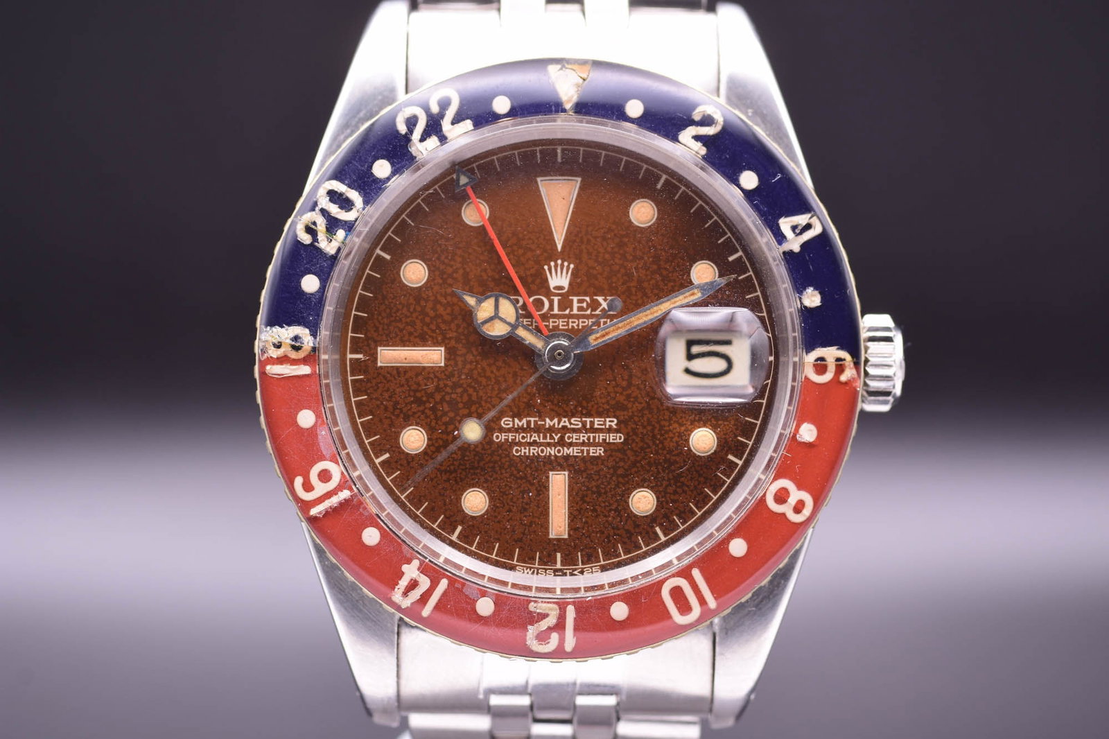 Rolex GMT Master A Rare and Highly Collectible Dual Time Wristwatch with "Tropical" Dial and Bakelit (1 of 8)