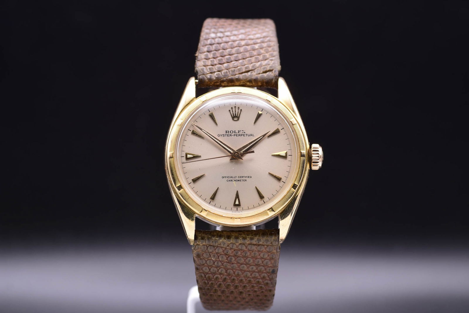Rolex Oyster Perpetual 14k Yellow Gold Semi Bubbleback Ref 6085: 1953BA truly exceptional example of early post-war horology, this 1953 Rolex Oyster Perpetual Reference 6085 presents in a striking 14k yellow gold case, celebrated by collectors for its distinctive "