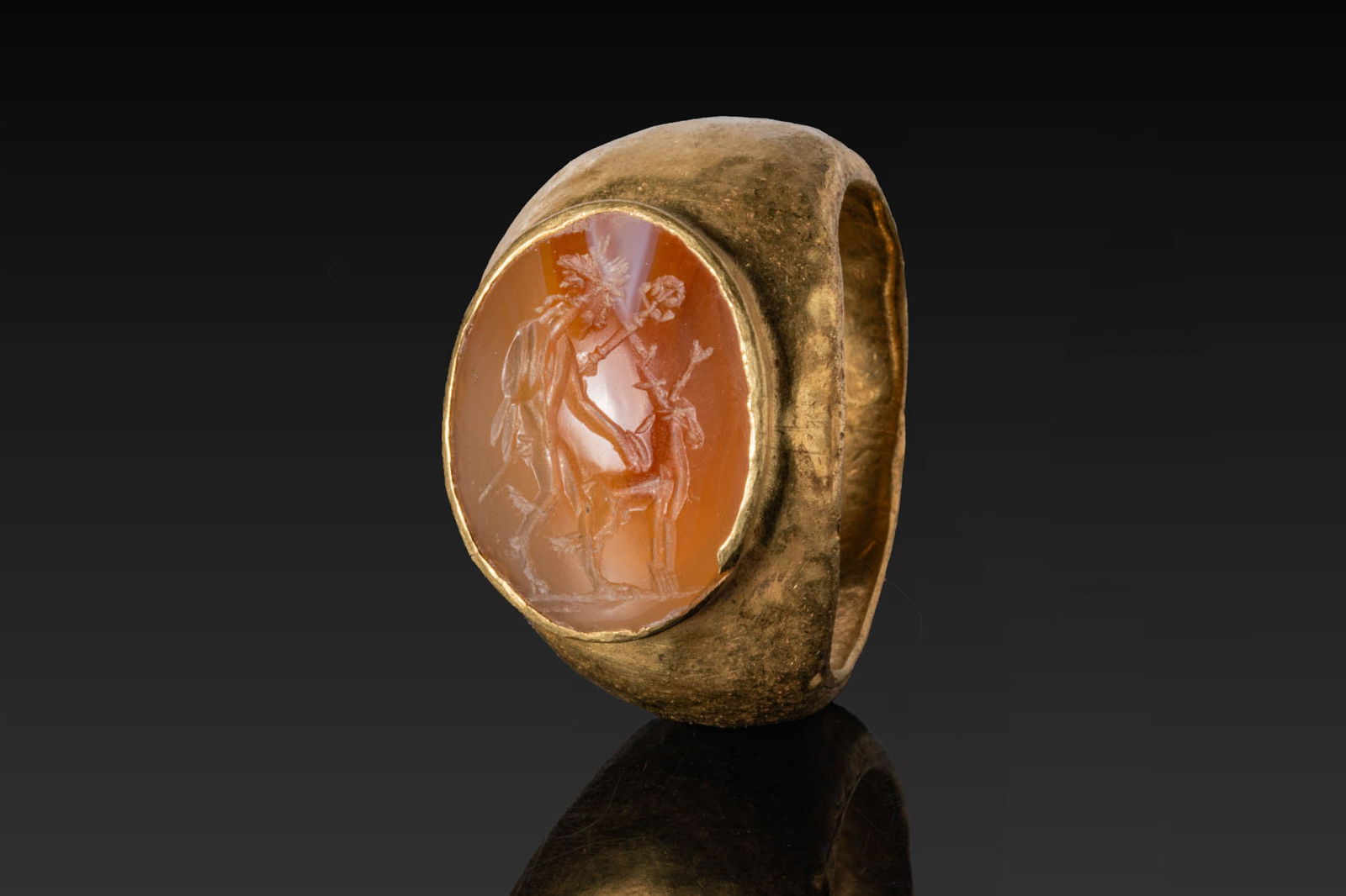 ROMAN HIGH KARAT GOLD RING WITH CARNELIAN INTAGLIO OF MERCURY AND DEER (1 of 4)