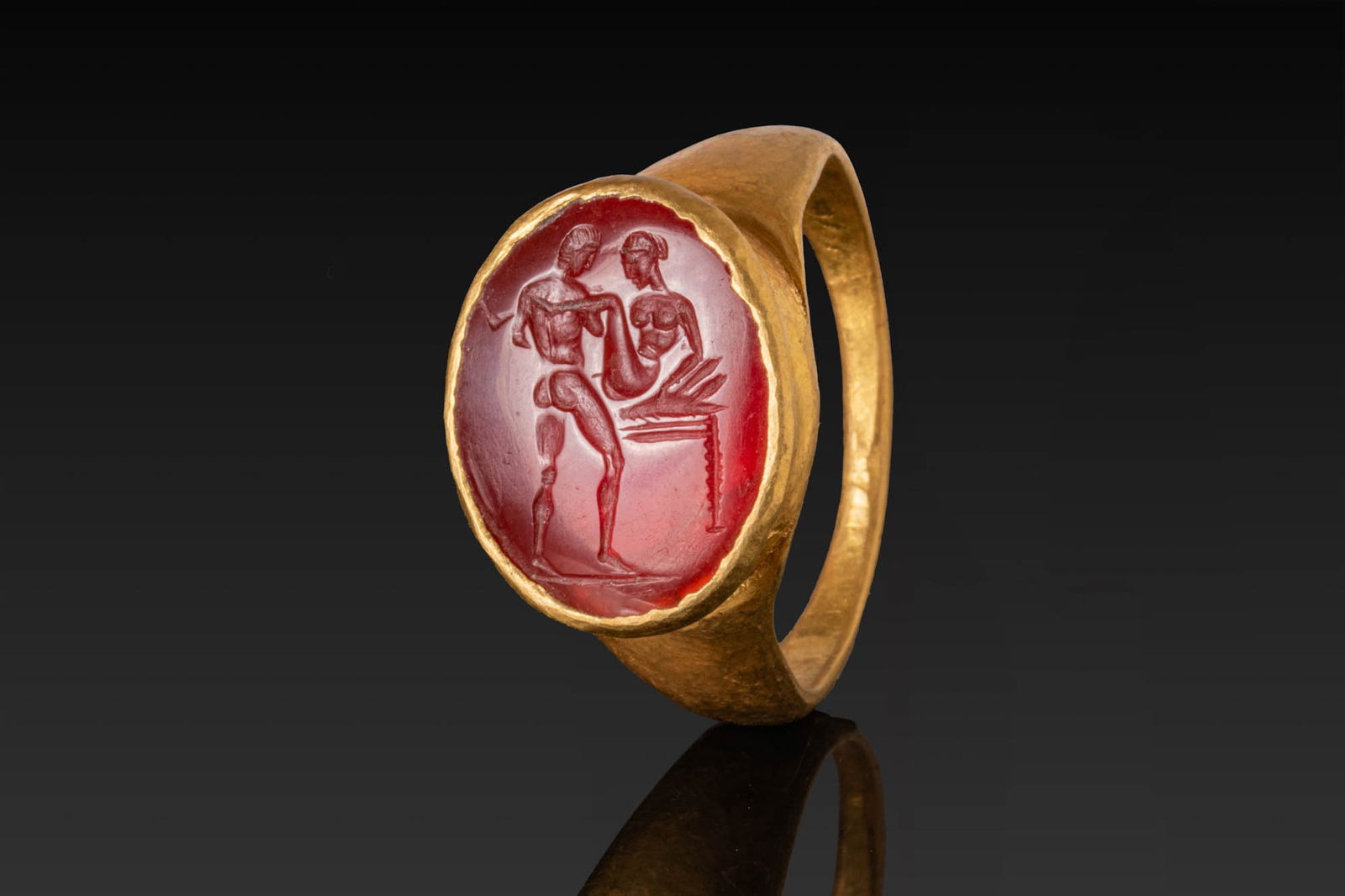 ROMAN (or later) CARNELIAN INTAGLIO OF AN EROTIC SCENE IN HIGH KARAT GOLD RING (1 of 5)