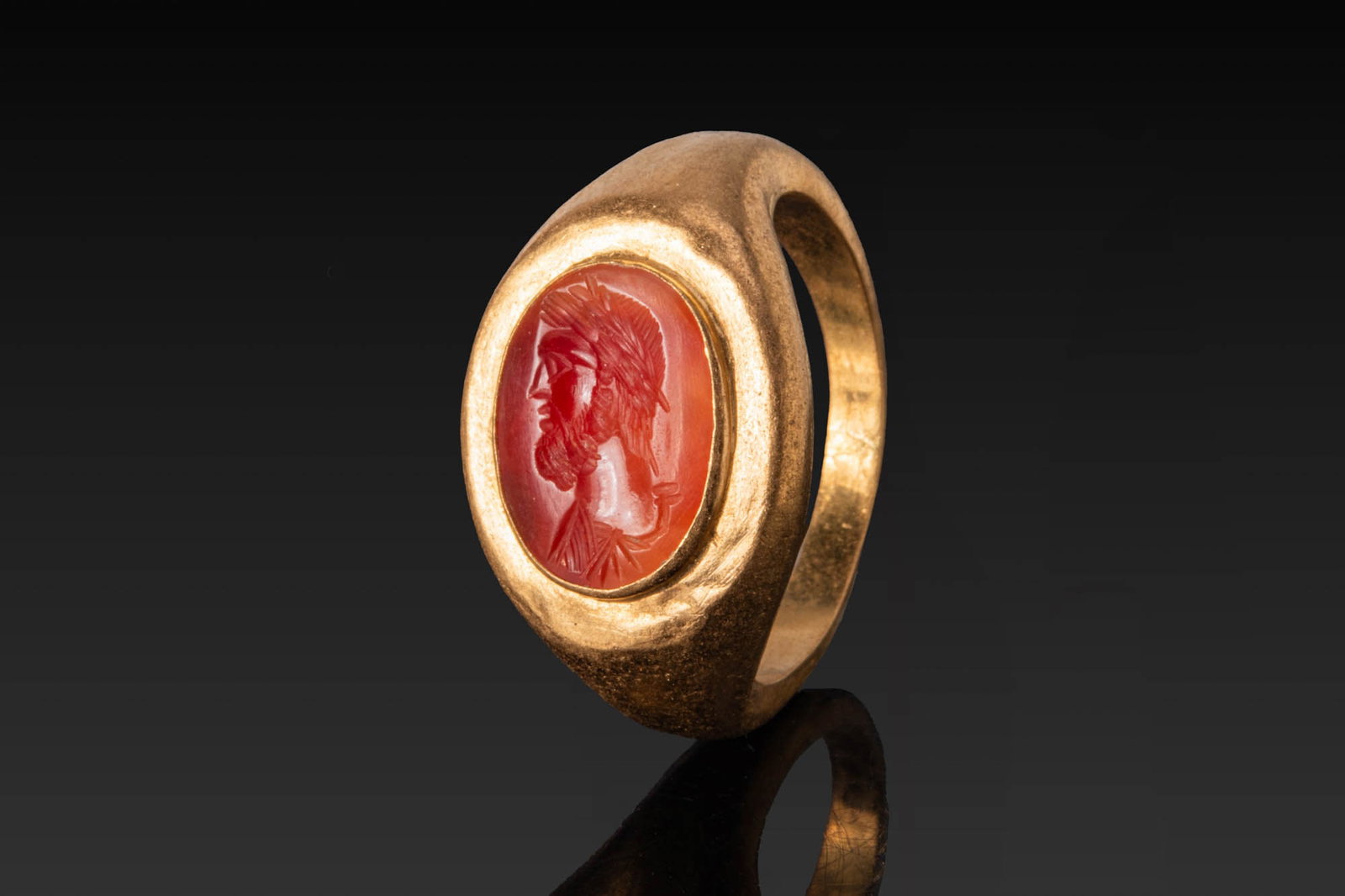 ROMAN HIGH KARAT GOLD RING WITH CARNELIAN INTAGLIO OF EMPEROR (1 of 3)