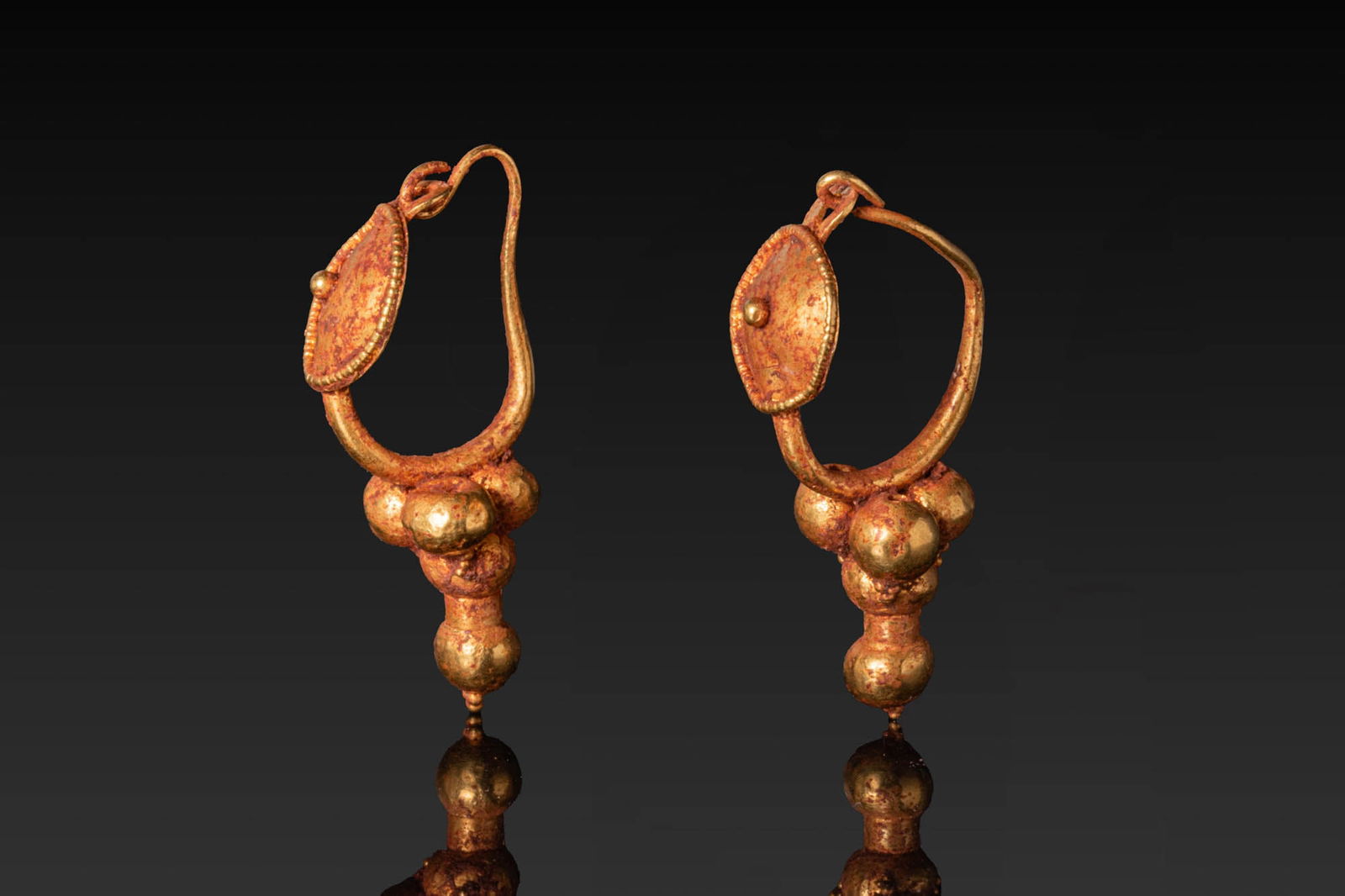 MATCHED PAIR OF ROMAN HIGH KARAT GOLD EARRINGS (1 of 7)
