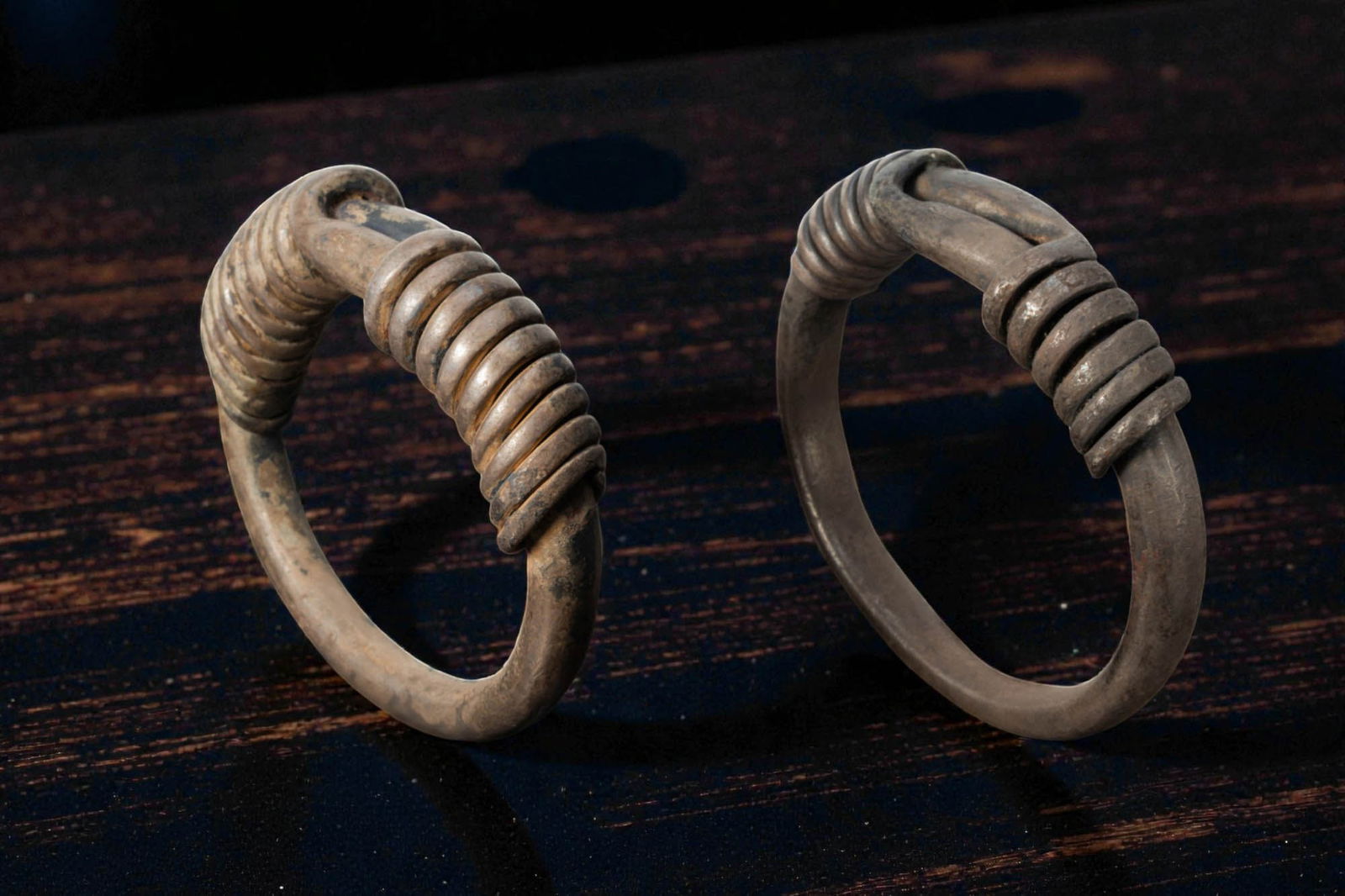 MATCHED PAIR OF ROMANO-EGYPTIAN SILVER BRACELETS (1 of 8)