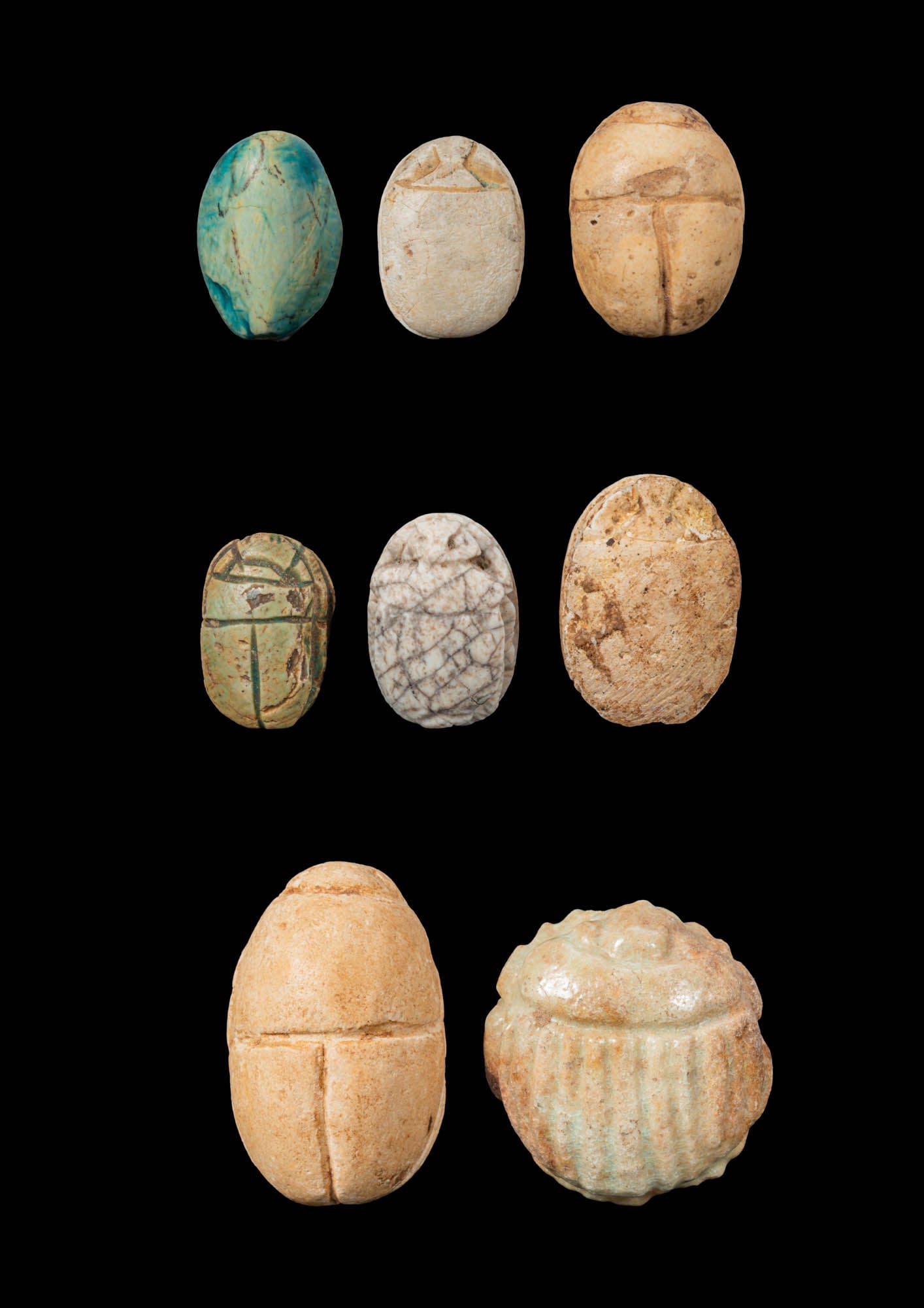 COLLECTION OF EGYPTIAN STONE AND FAIENCE SCARABS (1 of 2)