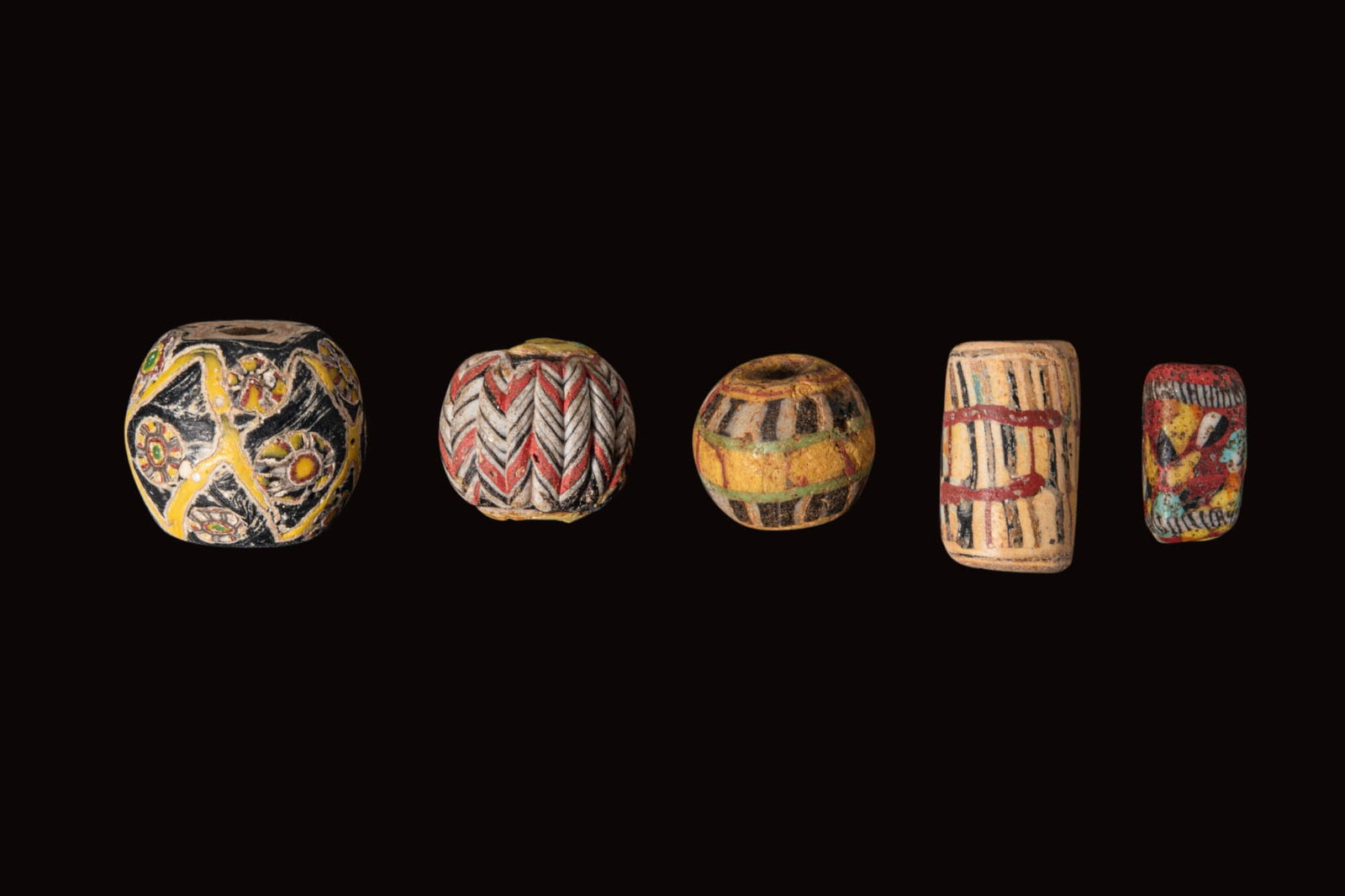 COLLECTION OF HELLENISTIC POLYCHROME GLASS BEADS (1 of 3)