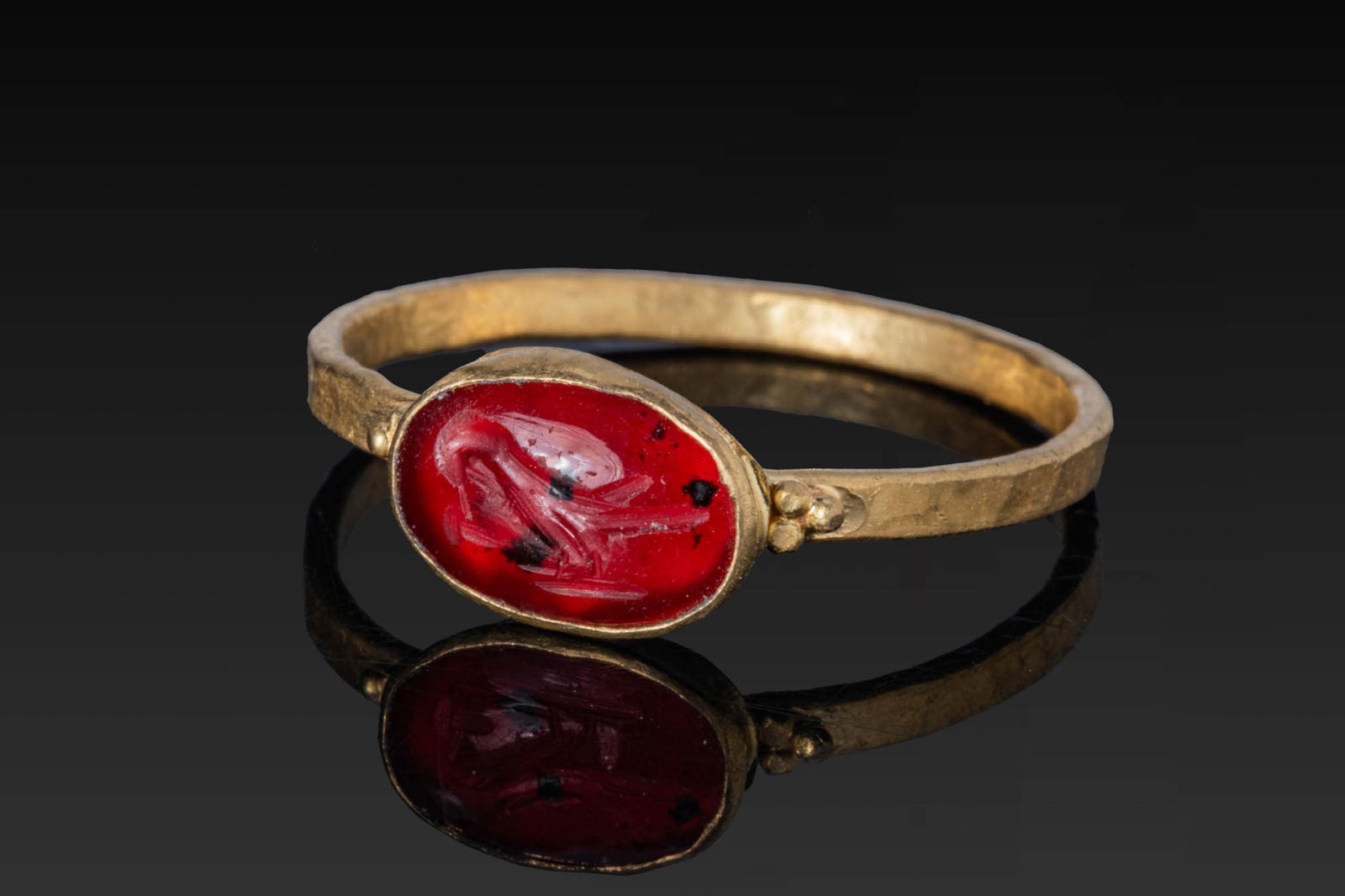ROMAN HIGH KARAT GOLD RING WITH RED GARNET INTAGLIO OF A BIRD (1 of 3)