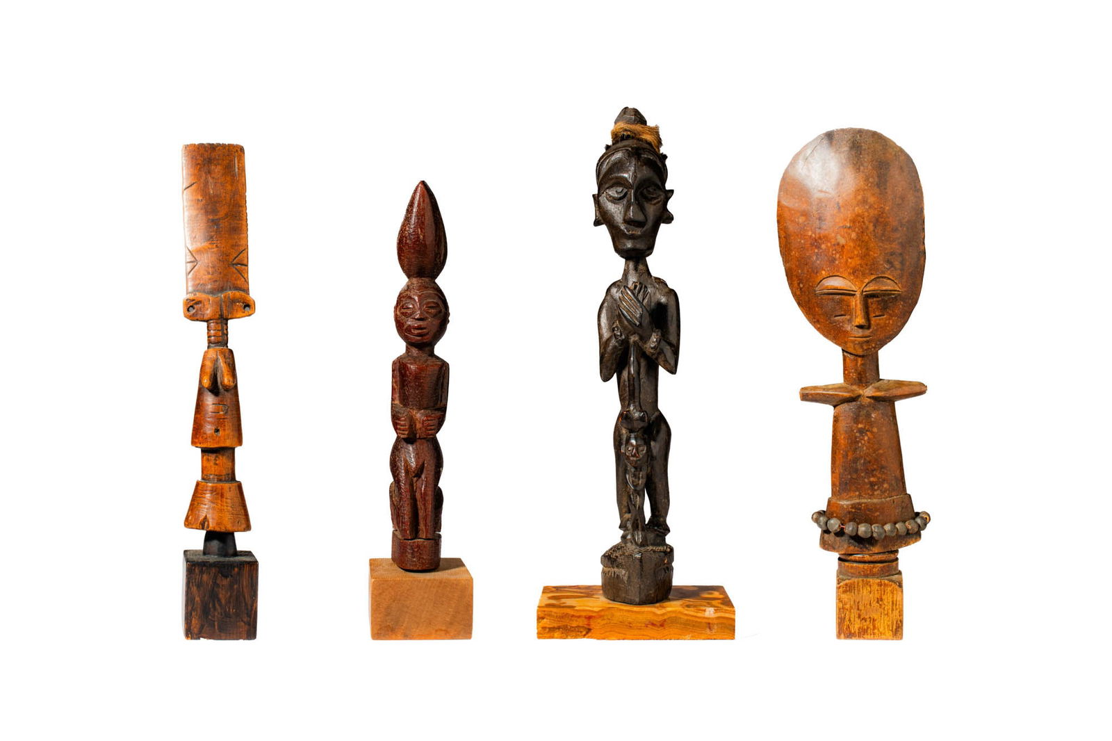 GROUP OF FOUR AFRICAN FIGURES (1 of 4)