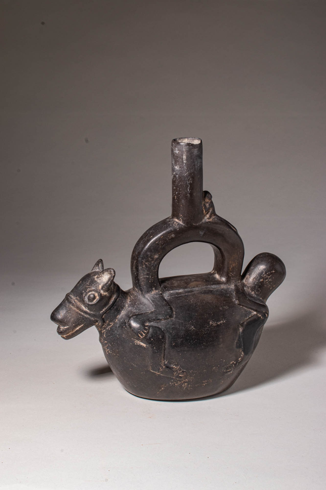 CHIMU BLACKWARE STIRRUP VESSEL OF FIGURE ON LLAMA (1 of 10)