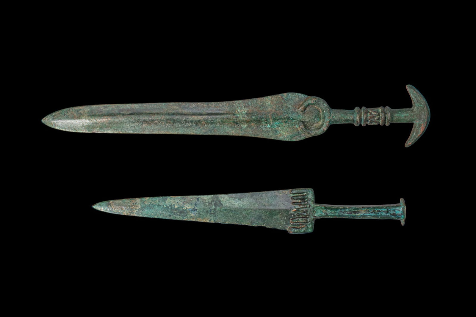 PAIR OF BRONZE AGE / EARLY GREEK PERIOD BRONZE DAGGERS (1 of 2)