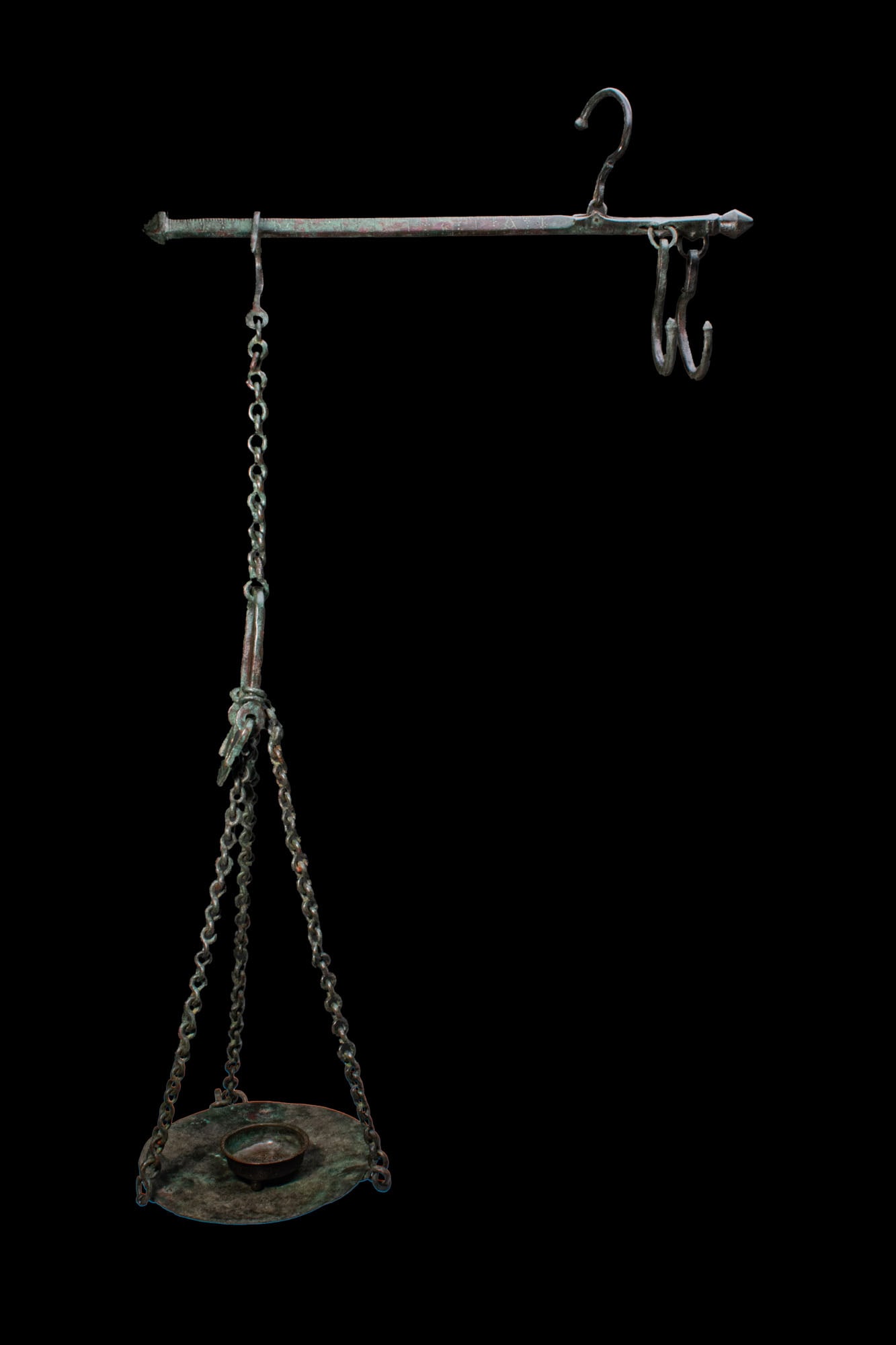 BYZANTINE BRONZE SCALE WITH INSCRIPTION: Ca. AD 500. A bronze steelyard scale with a long faceted beam engraved with graduations and an inscription, the ends finished with pointed finials. Above the beam sits a pivoting suspension hook, with