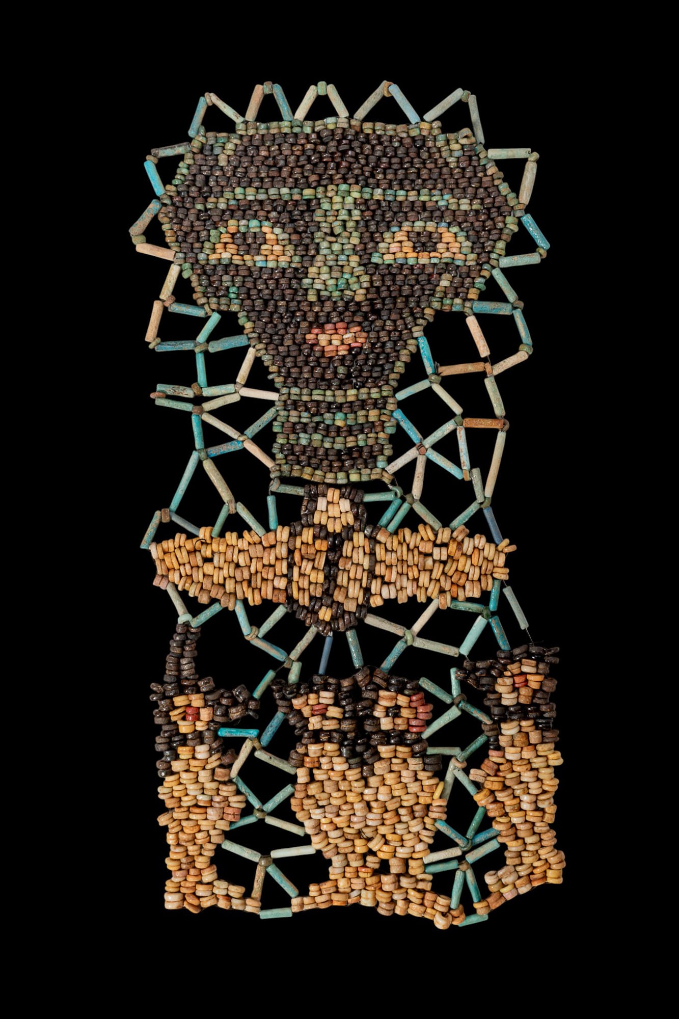 EGYPTIAN FAIENCE SHROUD WITH WINGED SCARAB AND SONS OF HORUS: Late Period, Ca. 664 - 30 BC. A restrung shroud composed of threaded disc-shaped and tubular faience beads arranged as an openwork panel, depicting the deceased?s face, a winged scarab, and the four S