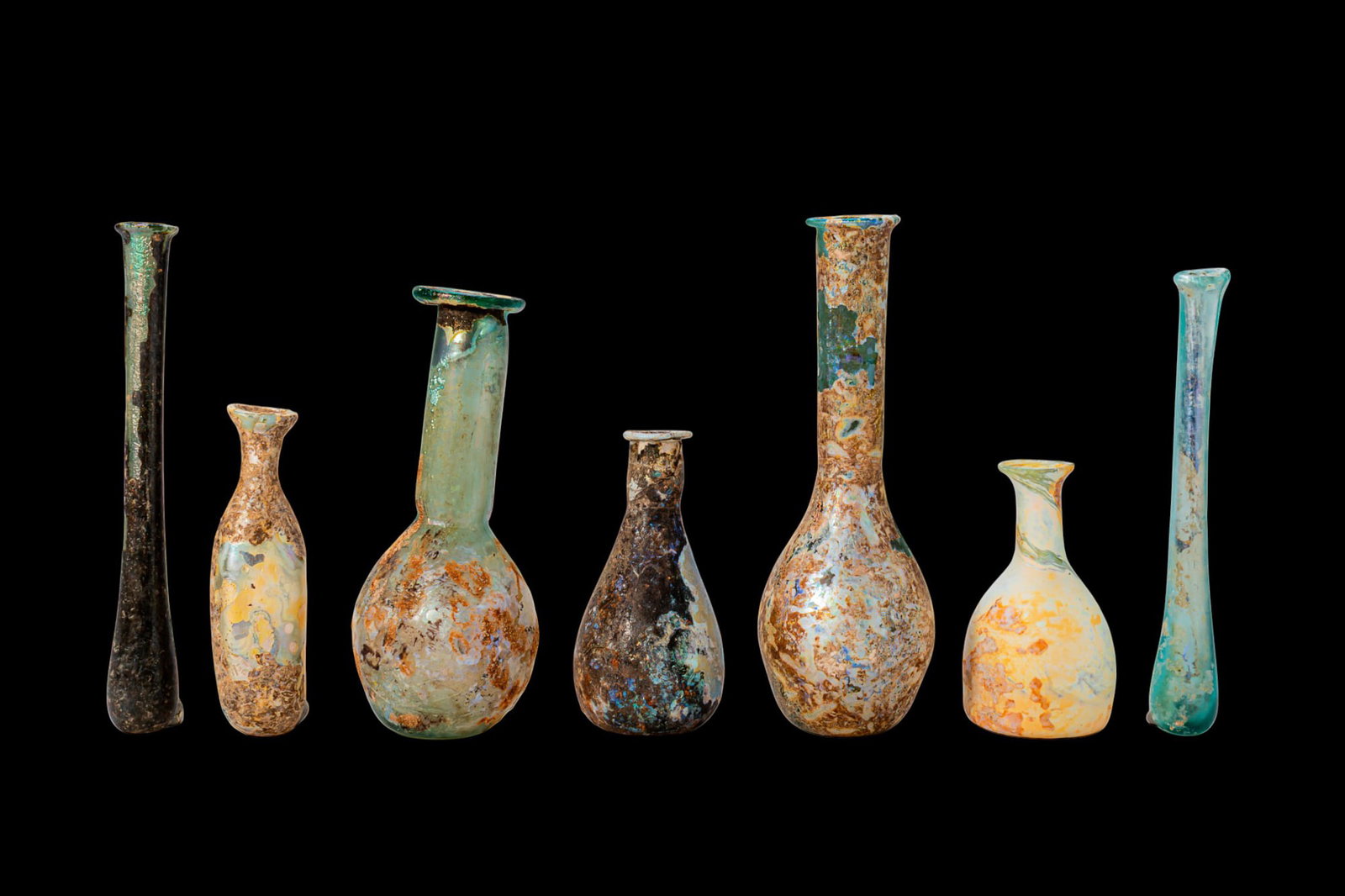 COLLECTION OF ROMAN GLASS UNGUENTARIA (1 of 4)