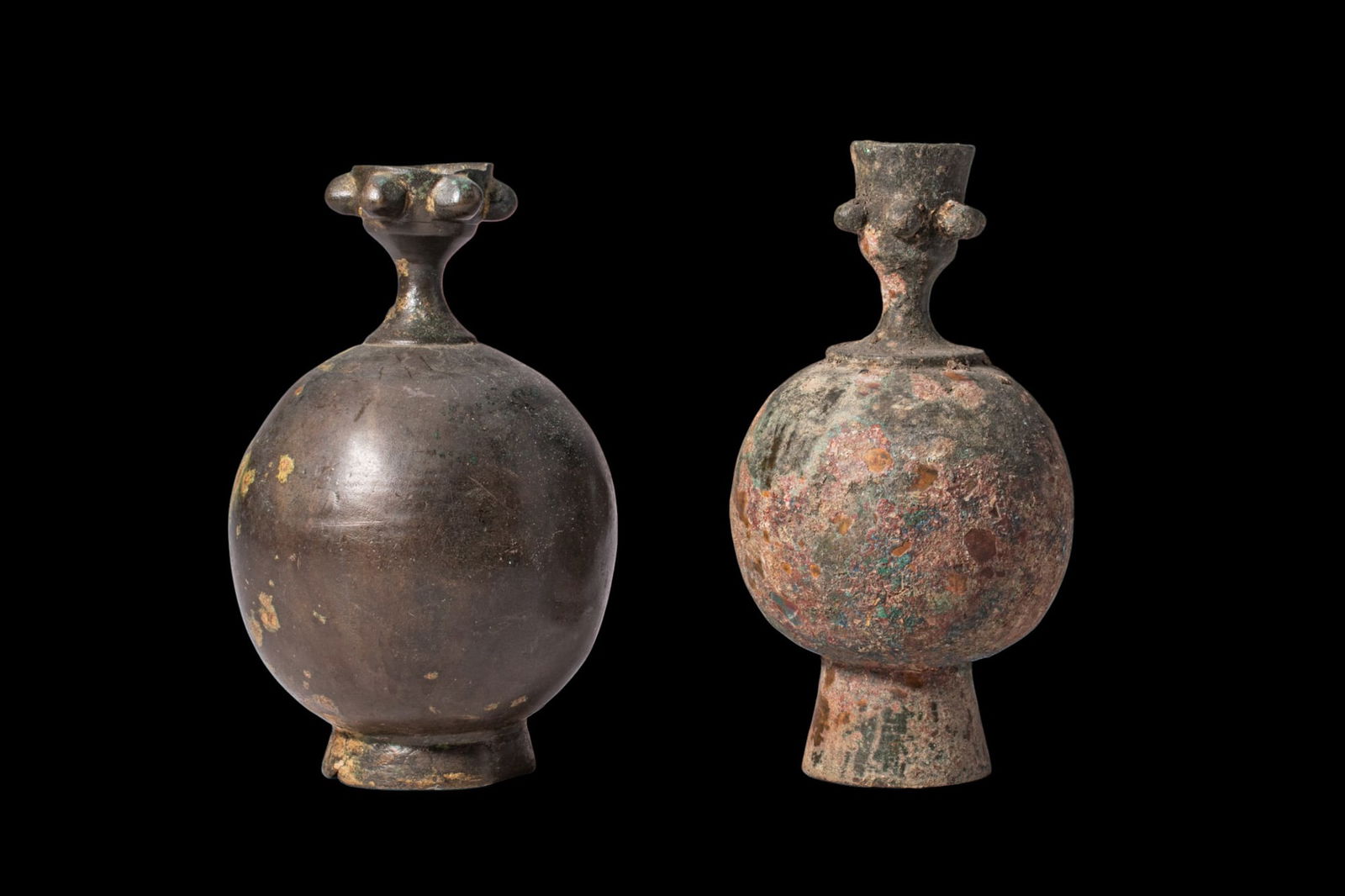 PAIR OF SELJUK BRONZE APPLE-SHAPED SPRINKLER BOTTLES WITH KNOPS (1 of 3)