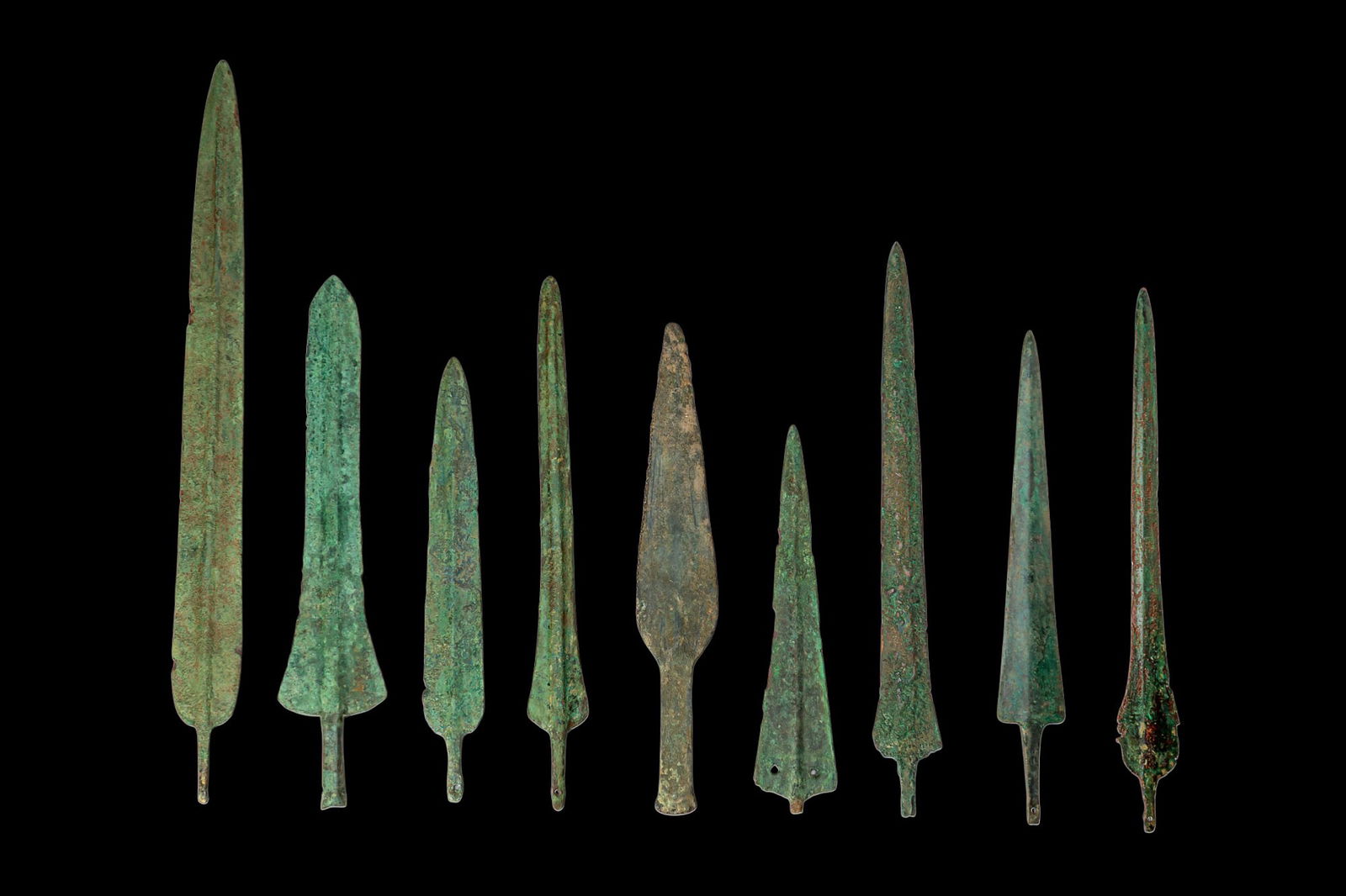 COLLECTION OF BRONZE AGE BRONZE SPEARHEADS AND DAGGERS (1 of 2)
