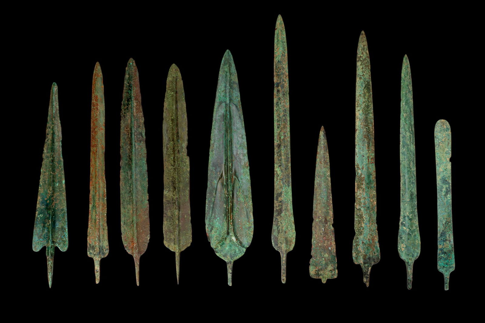 COLLECTION OF BRONZE AGE BRONZE SPEARHEADS AND DAGGERS (1 of 2)