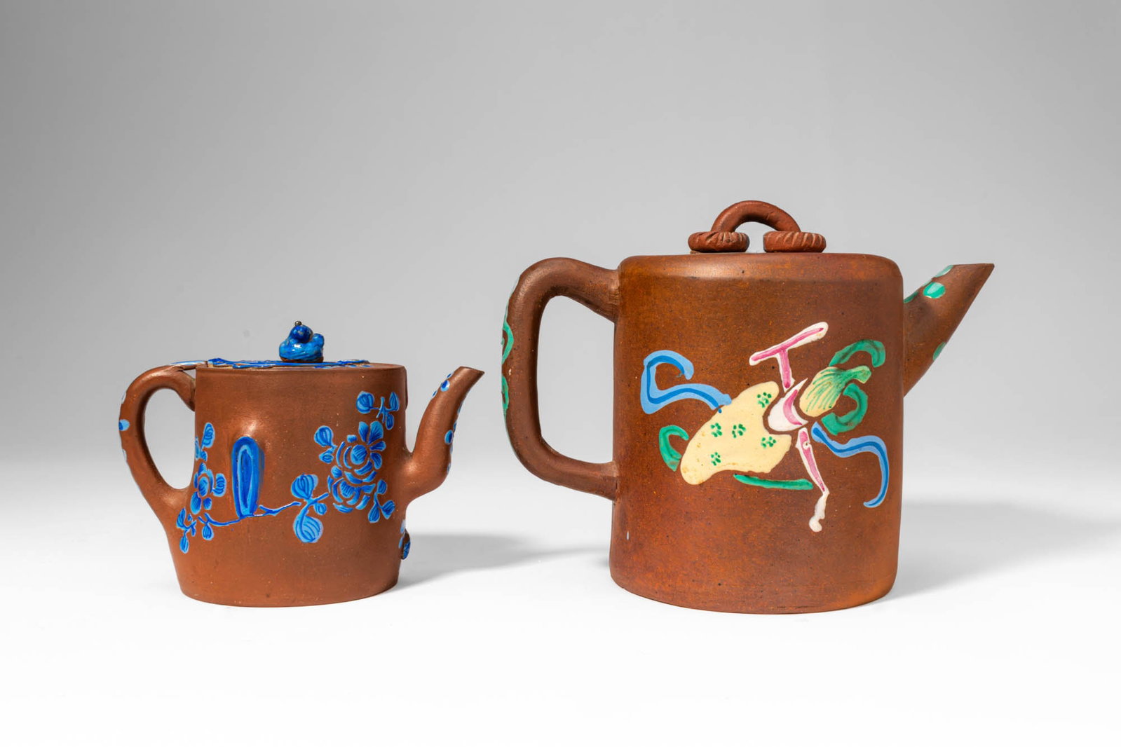 TWO ENAMEL PAINTED YIXING TEAPOTS (1 of 7)