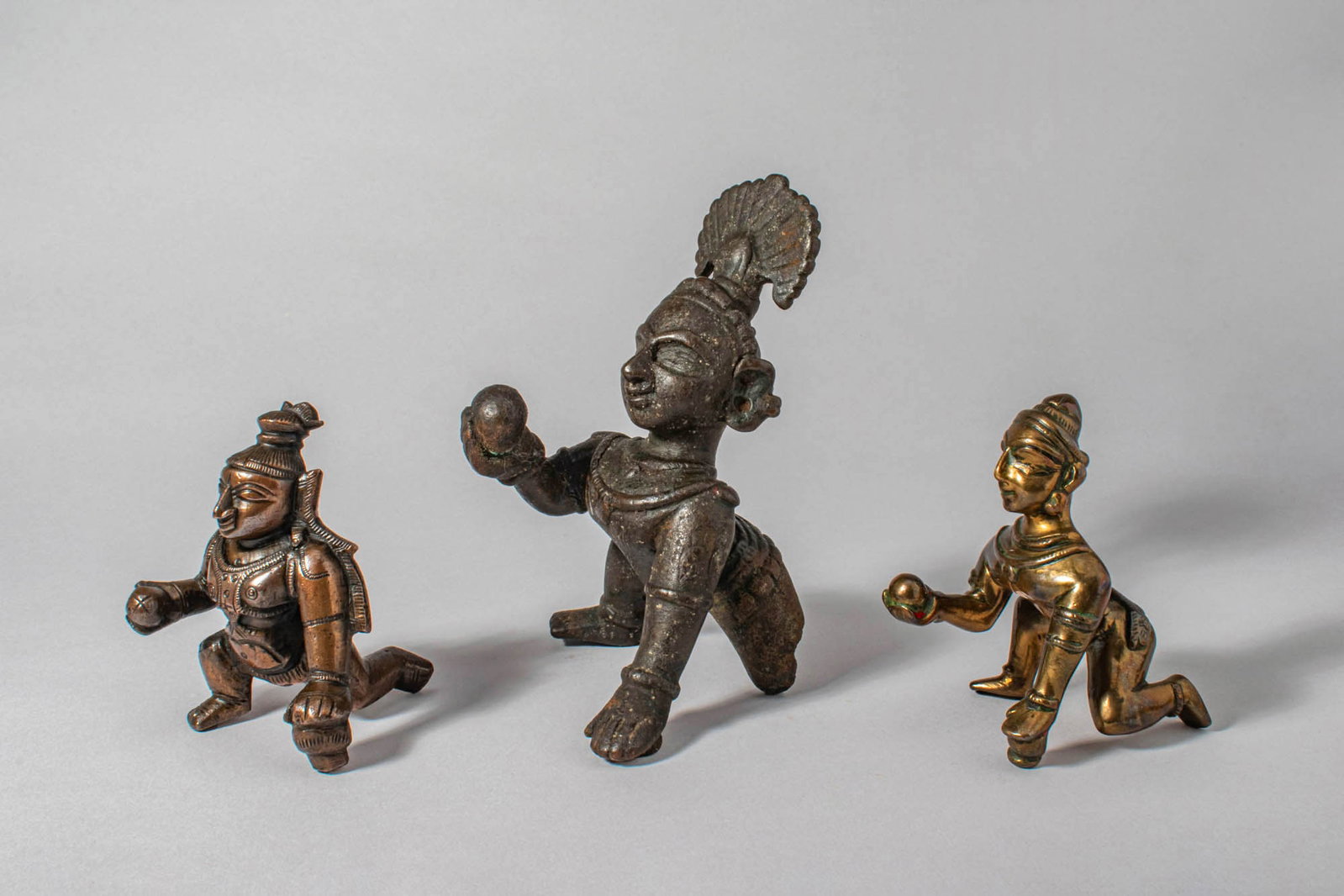 GROUP OF THREE INDIAN BRONZE KRISHNA BUTTER THIEVES (1 of 5)