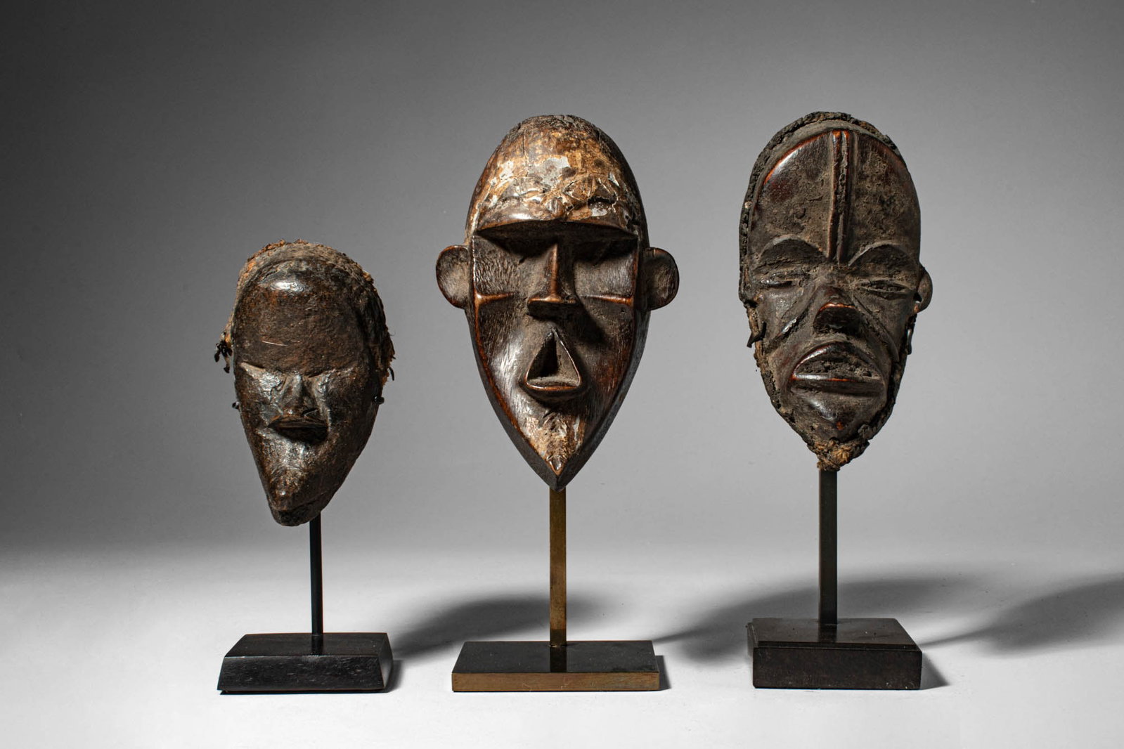 GROUP OF AFRICAN PASSPORT MASKS (1 of 4)