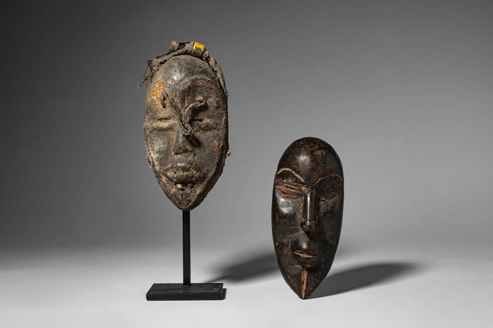 TWO AFRICAN PASSPORT MASKS (1 of 4)