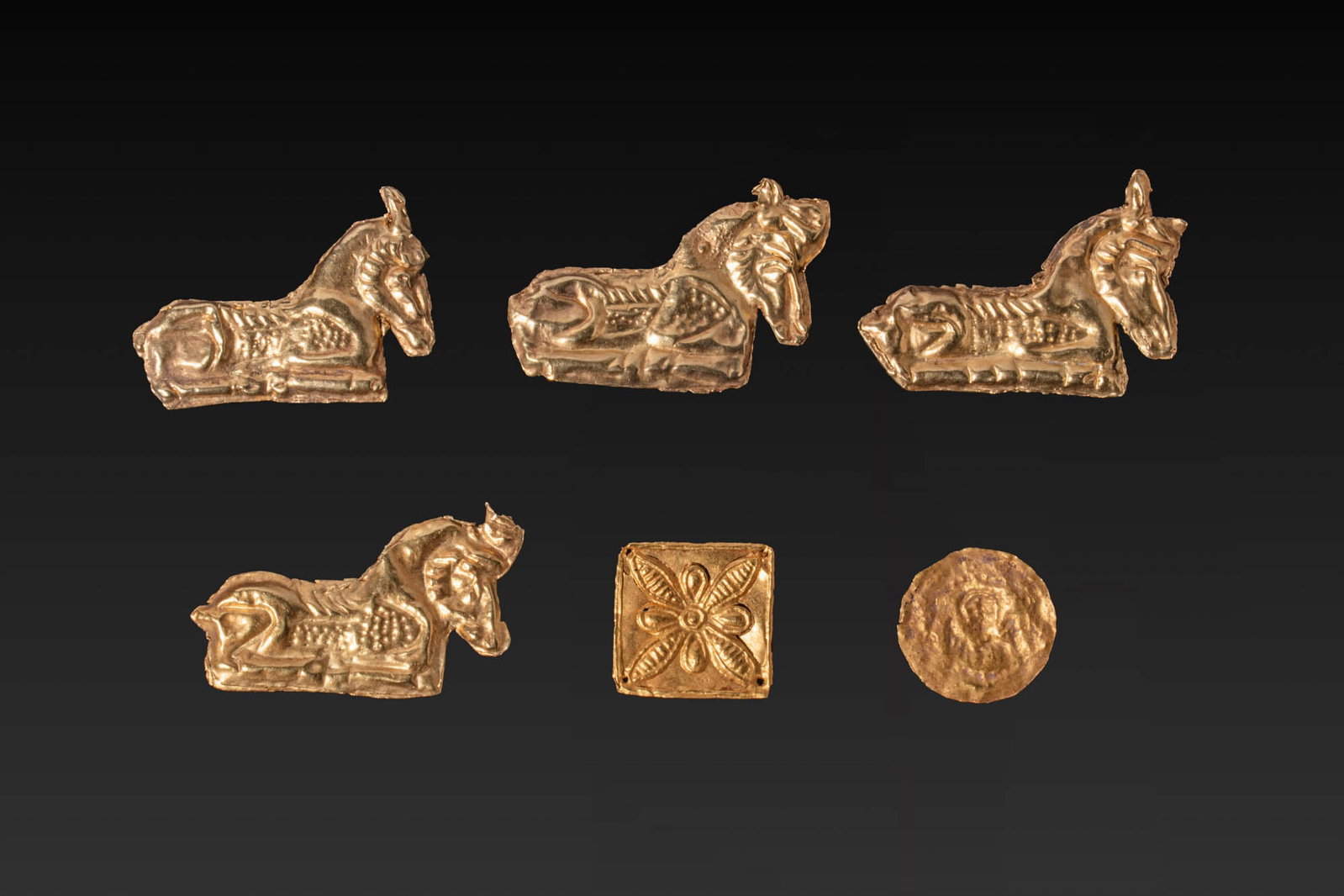 COLLECTION OF GREEK GOLD IBEX AND FLOWER-SHAPED APPLIQUES (1 of 5)