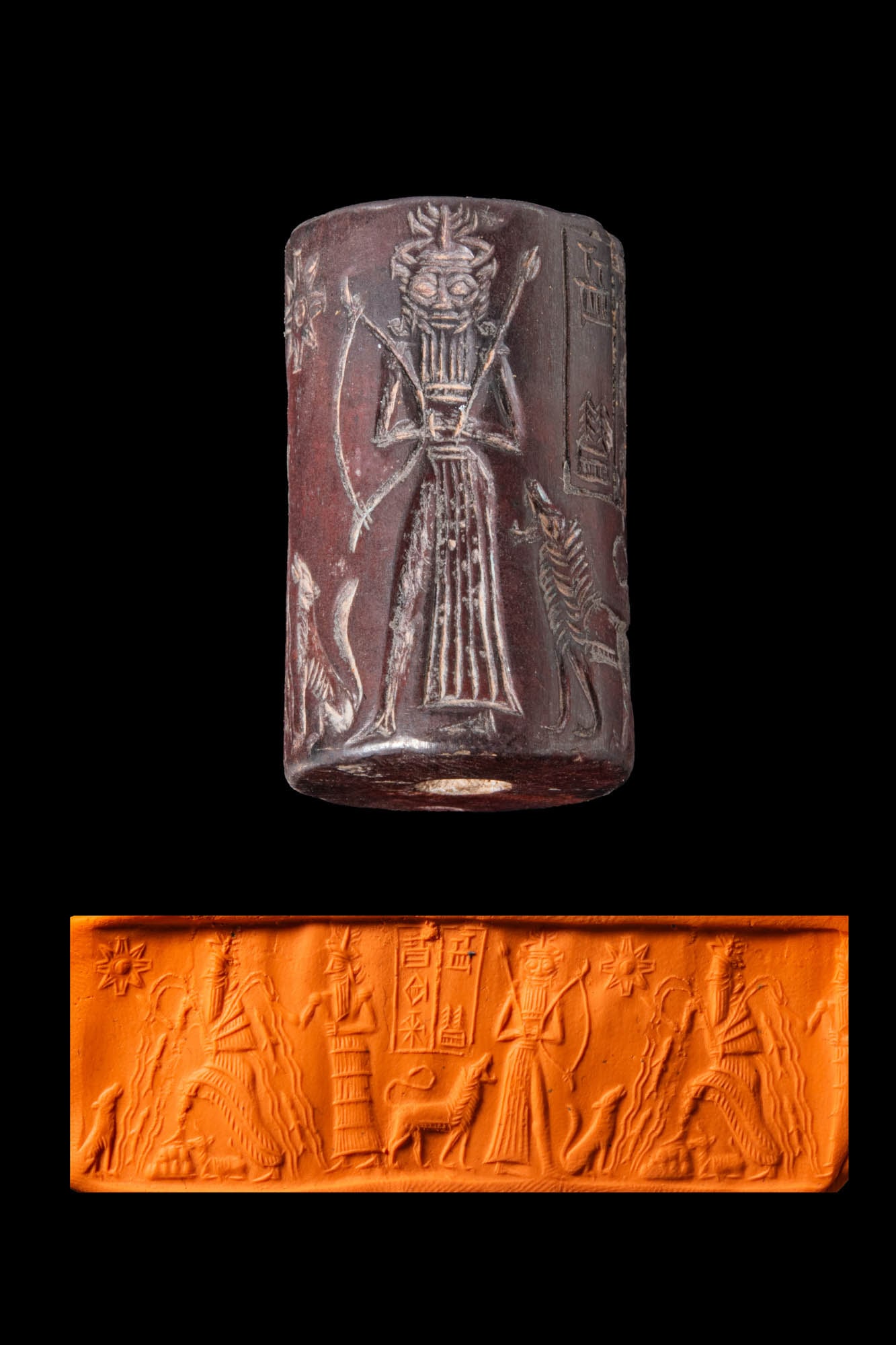 AKKADIAN DARK REDDISH STONE CYLINDER SEAL WITH ENKI, AN ATTENDANT DEITY, AND CUNEIFORM INSCRIPTION: Ca. 2300 - 2200 BC. A dark reddish stone cylinder seal, drilled longitudinally and engraved with Enki holding a vessel from which four torrents with fish flow. Another deity, accompanied by a lion and