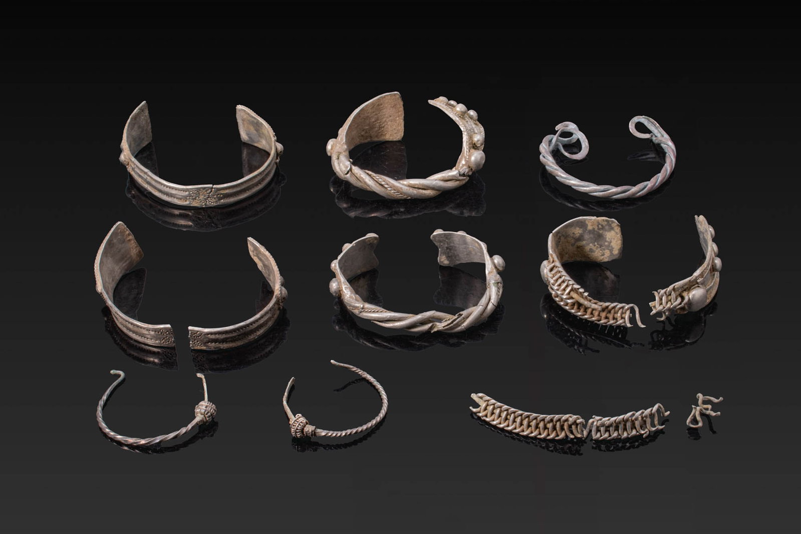 COLLECTION OF VIKING PERIOD SILVER BRACELETS AND EARRINGS (1 of 4)