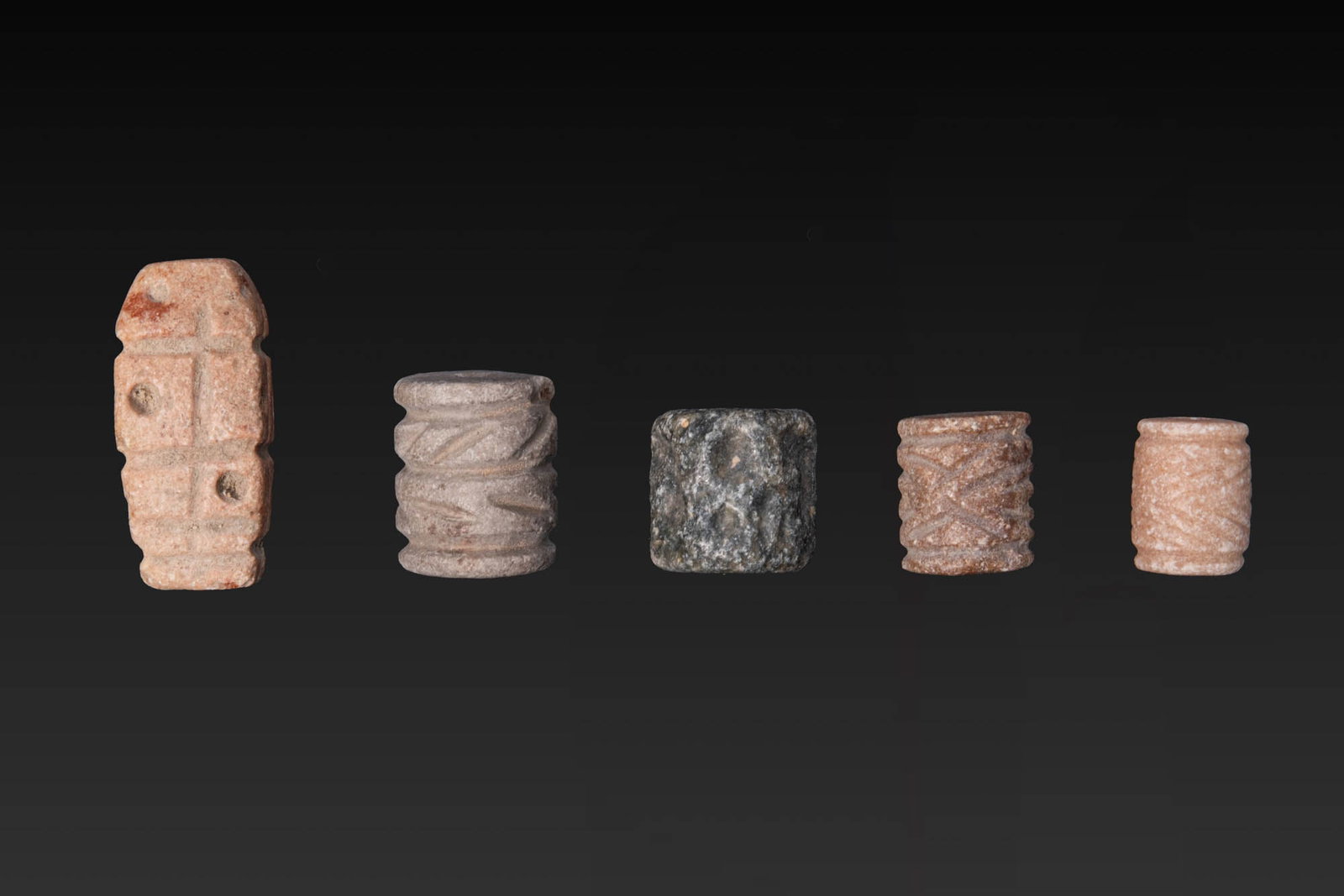 COLLECTION OF JEMDET NASR AND MESOPOTAMIAN STONE CYLINDER SEALS WITH GEOMETRIC MOTIFS (1 of 3)