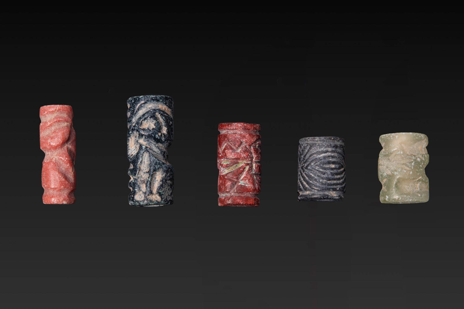 COLLECTION OF JEMDET NASR AND MESOPOTAMIAN STONE CYLINDER SEALS WITH GEOMETRIC MOTIFS (1 of 3)