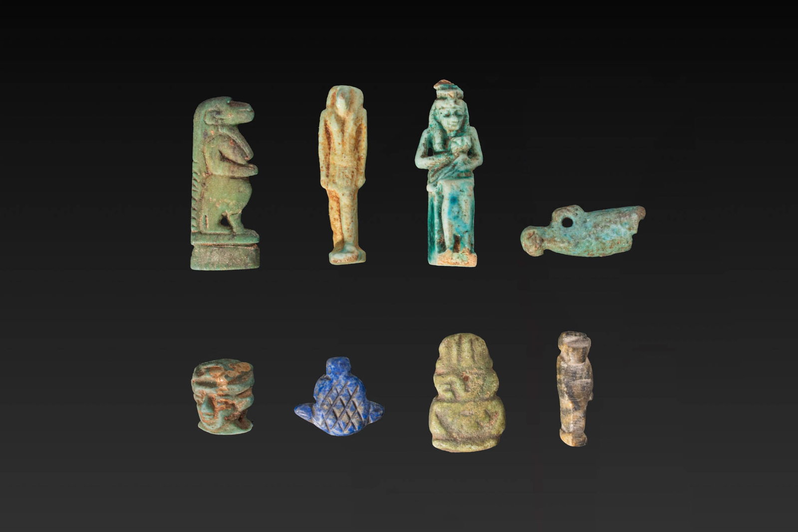 LARGE COLLECTION OF EGYPTIAN FAIENCE AMULETS (1 of 2)