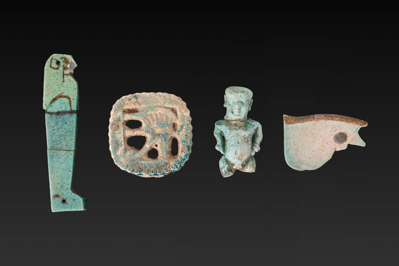 LARGE COLLECTION OF EGYPTIAN FAIENCE AMULETS (1 of 2)