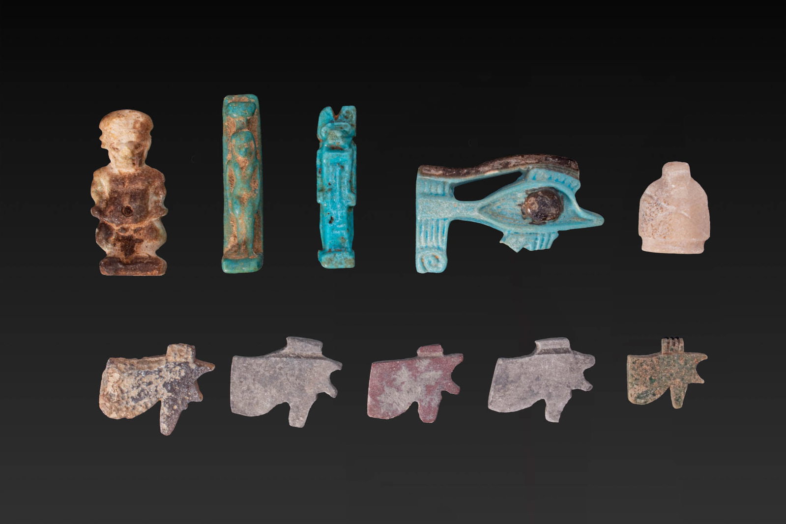 LARGE COLLECTION OF EGYPTIAN FAIENCE AND STONE AMULETS (1 of 5)