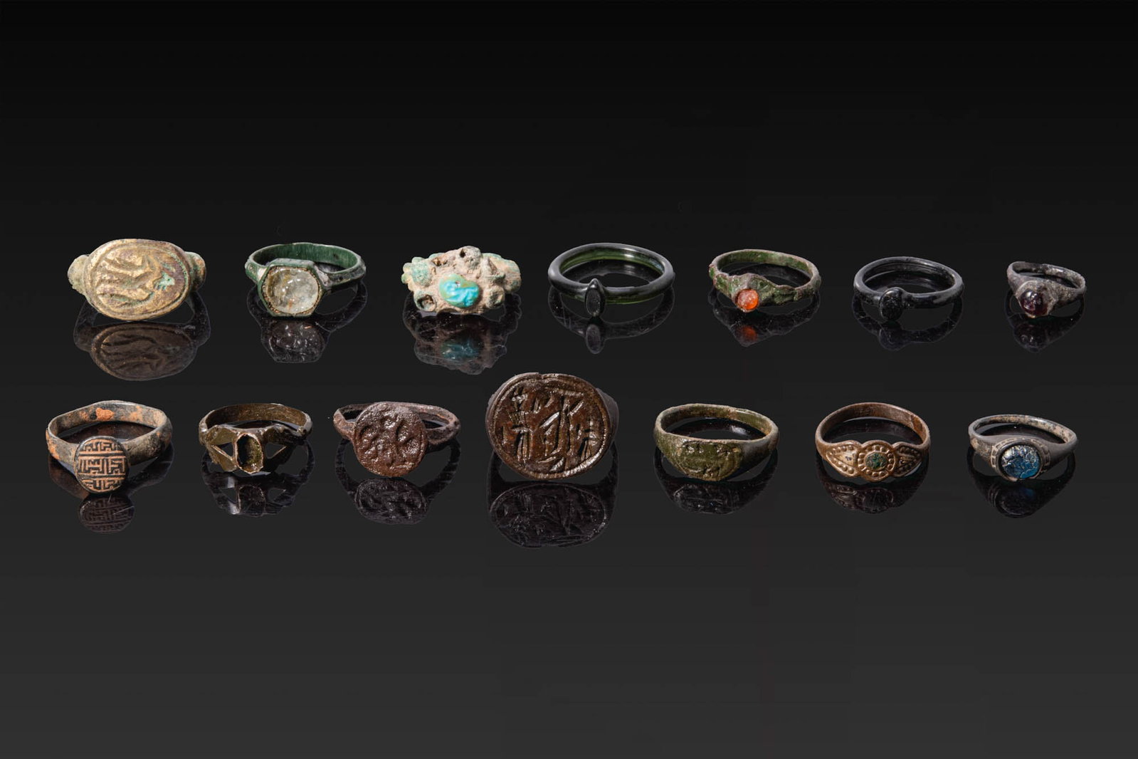 COLLECTION OF LATE ROMAN AND MEDIEVAL BRONZE AND GLASS RINGS (1 of 3)
