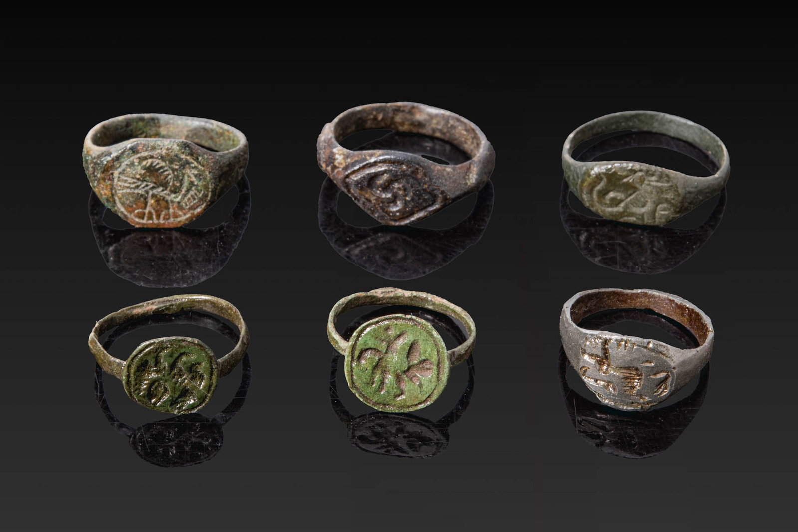 COLLECTION OF VIKING AGE BRONZE RINGS WITH ANIMAL AND GEOMETRICAL MOTIFS (1 of 3)