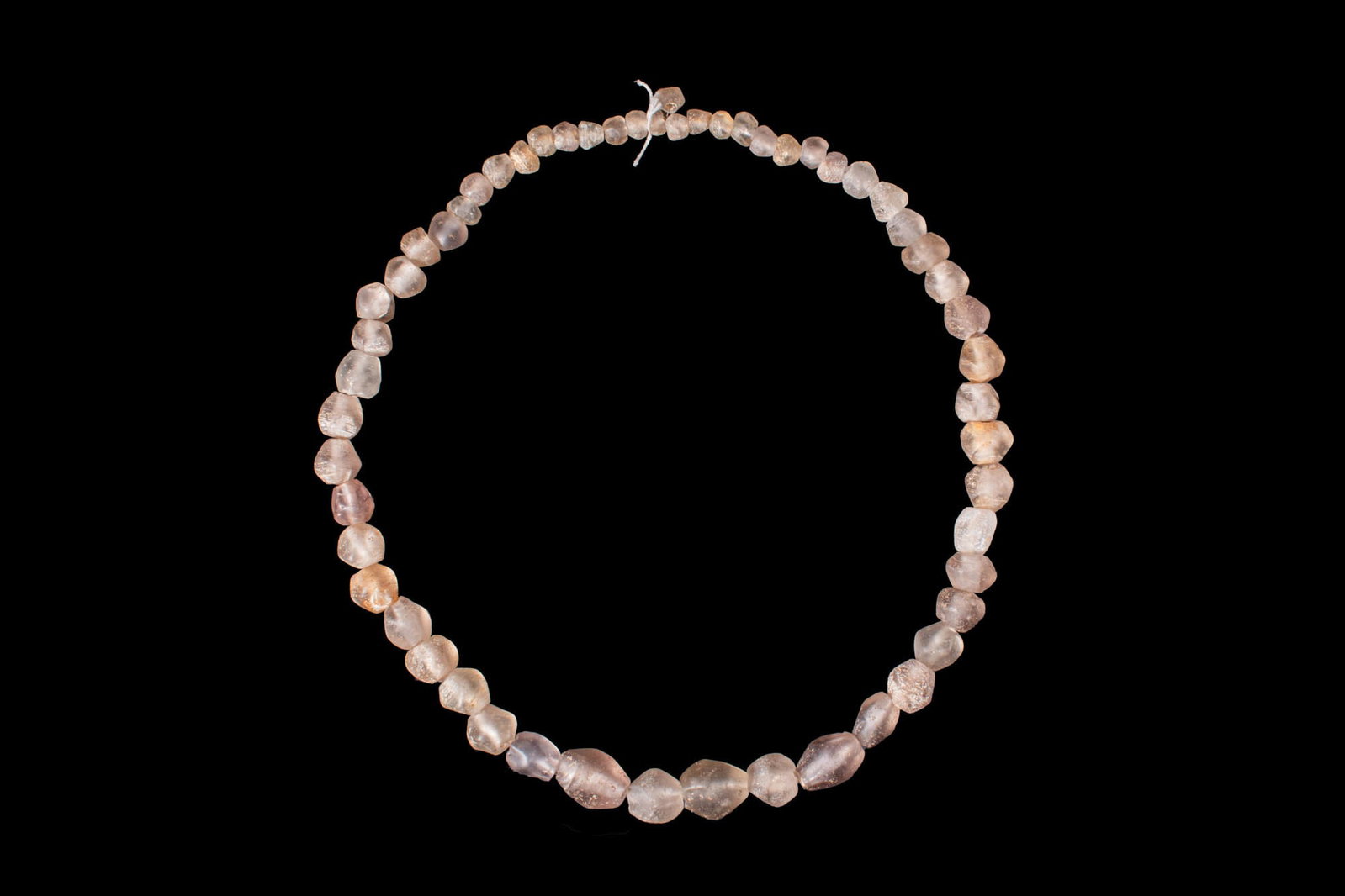 NEAR EASTERN ROCK CRYSTAL NECKLACE: Ca. 3rd - 2nd millennium BC. A necklace strand composed of faceted rock crystal beads, graduating in size towards the centre. Size: 370mm x 20mm; Weight: 195g Provenance: Prince Collection, 1990s–20