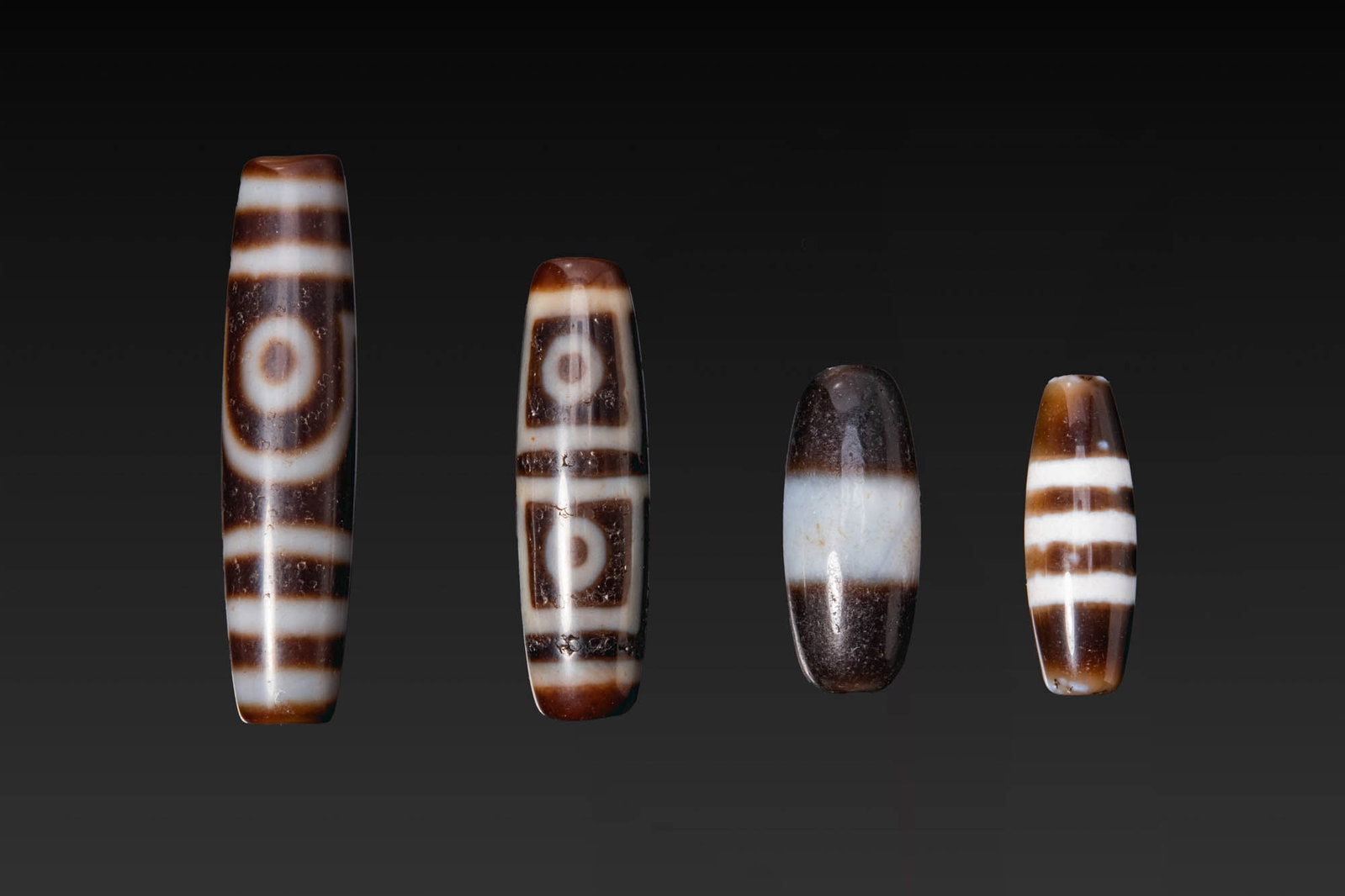 COLLECTION OF LARGE TIBETAN AGATE DZI BEADS (1 of 3)