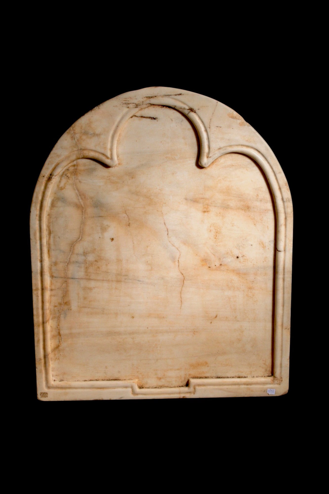 LARGE BYZANTINE MARBLE TABLE: Ca. AD 400 - 600. A large marble table with a rectangular slab and an arched upper end with three lobes. The upper face is recessed within a raised border. For similar see: The Metropolitan Museum of 