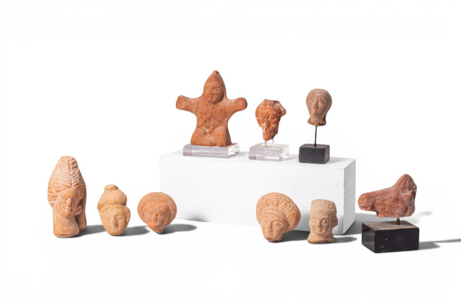 LARGE COLLECTION OF GREEK TERRACOTTA HEADS (1 of 2)