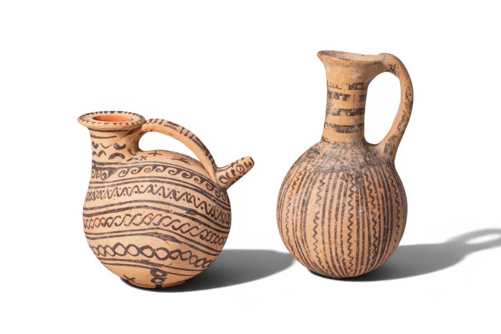 PAIR OF DAUNIAN AND CYPRIOT TERRACOTTA VESSELS WITH GEOMETRIC DECORATION (1 of 3)