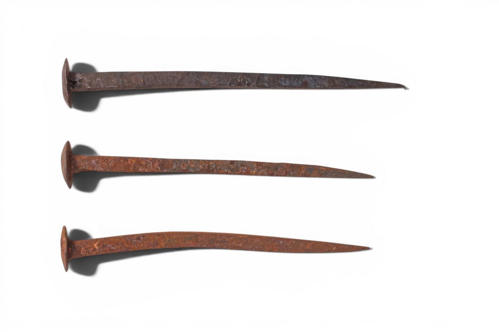 COLLECTION OF ROMAN IRON HAMMERED NAILS (1 of 2)