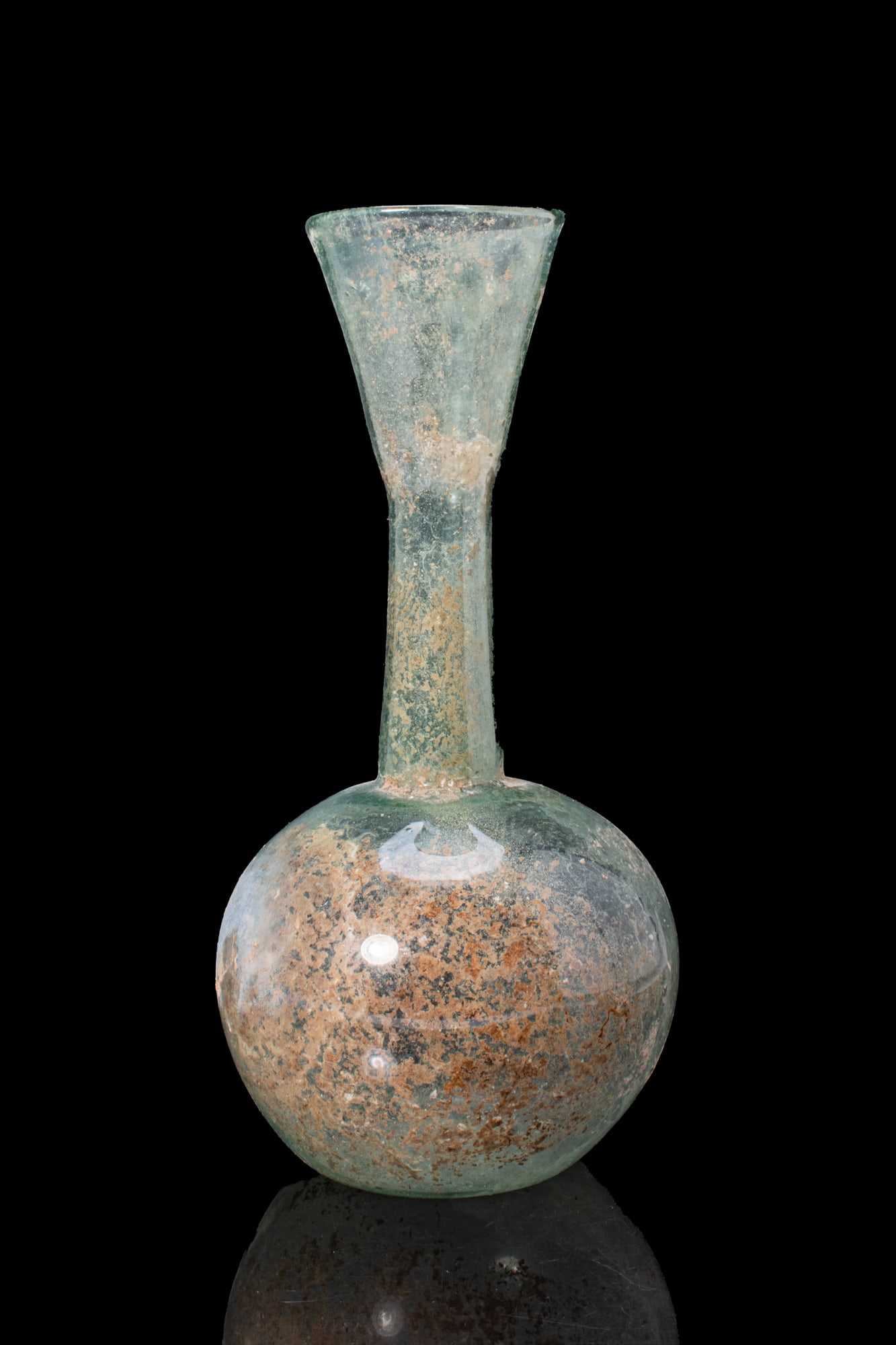 BYZANTINE GLASS FLASK: Ca. AD 600. A free-blown translucent blue-green glass flask with an apple-shaped body and a tall neck expanding to a flaring mouth. For similar see: Christie's, Live Auction 12256, Antiquities, 12 Apr