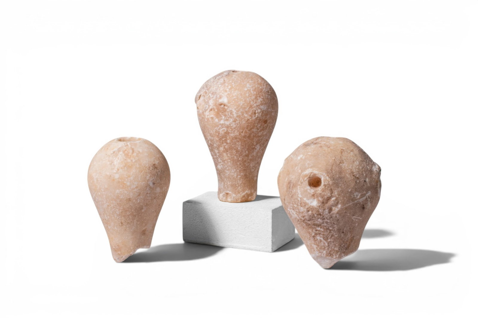COLLECTION OF WESTERN ASIATIC STONE MACE HEADS (1 of 2)
