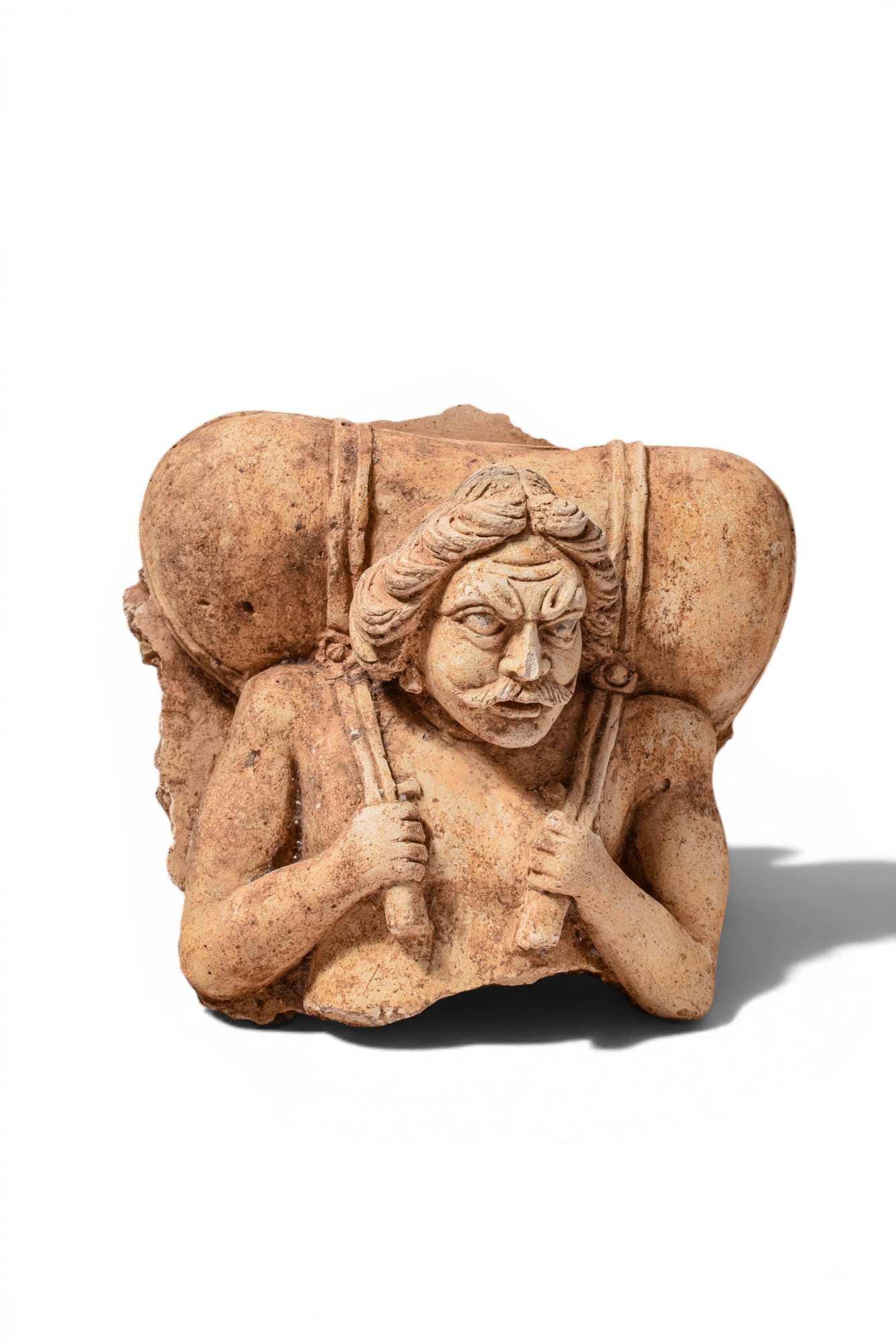 GANDHARA STUCCO OF BODHISATTVA HOLDING A BAG (1 of 3)