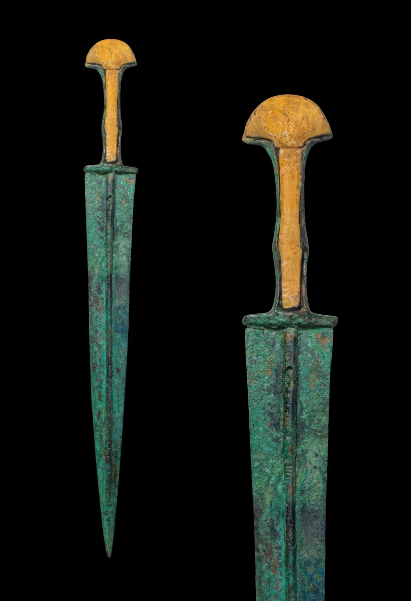 BRONZE AGE / EARLY GREEK PERIOD BRONZE DAGGER WITH BONE INLAID POMMEL: Ca. 1200 - 900 BC. A bronze dagger with a long tapering blade and a narrow point. A thick midrib runs along each face of the blade. The guard is short and straight. The grip is recessed between raised