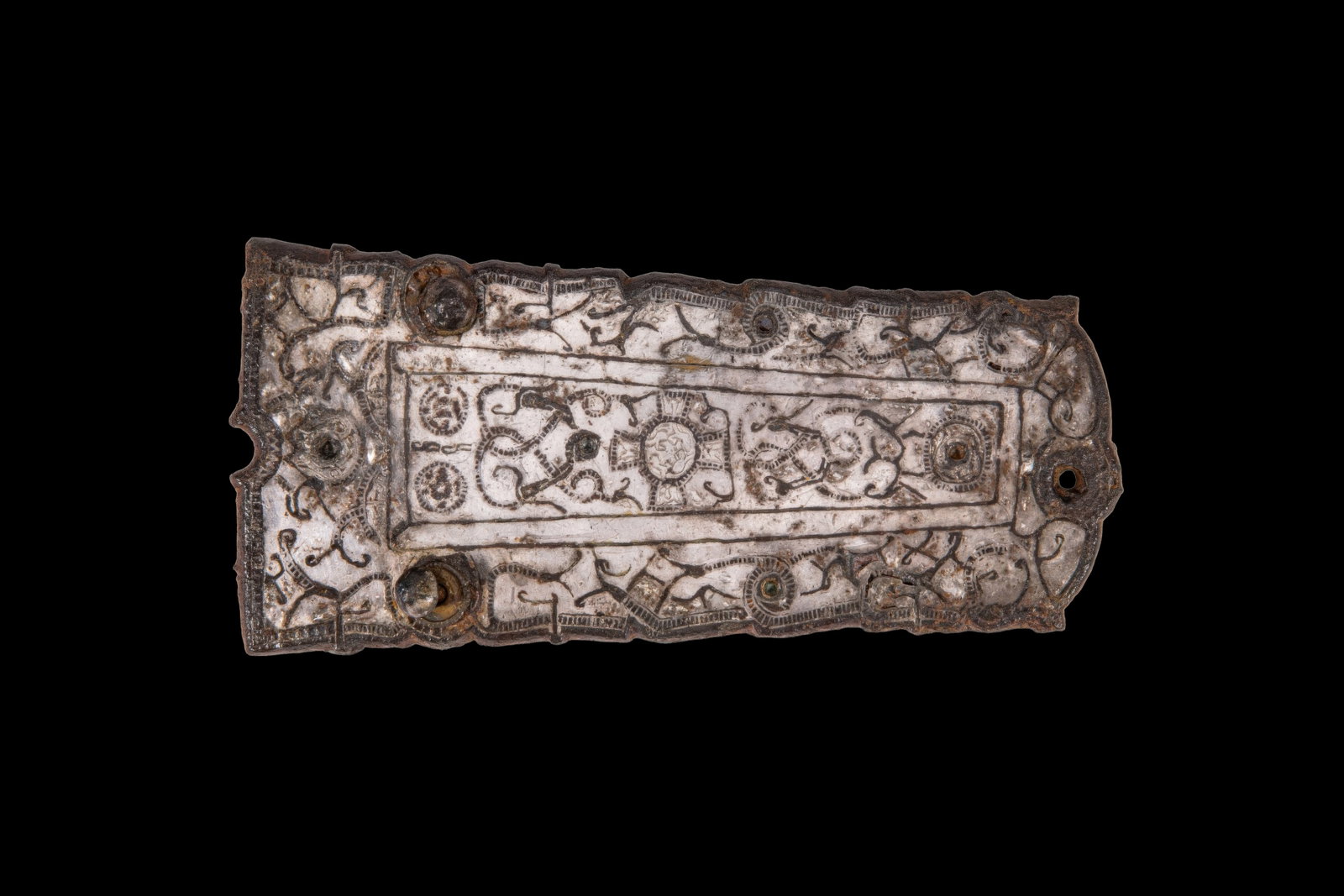 OUTSTANDING VIKING SILVER-INLAID BELT BUCKLE WITH CROSS: Ca. AD 700 - 800. A silver-inlaid iron belt buckle of rectangular shape with a rounded terminal. The main panel contains a cross with expanded arms between stylised animals and circular ornaments. The