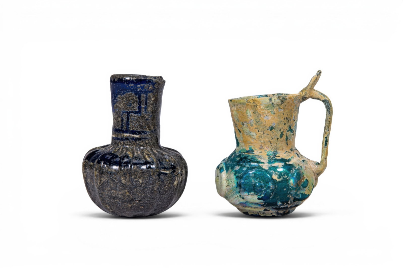 PAIR OF UMAYYAD GLASS VESSELS (1 of 3)