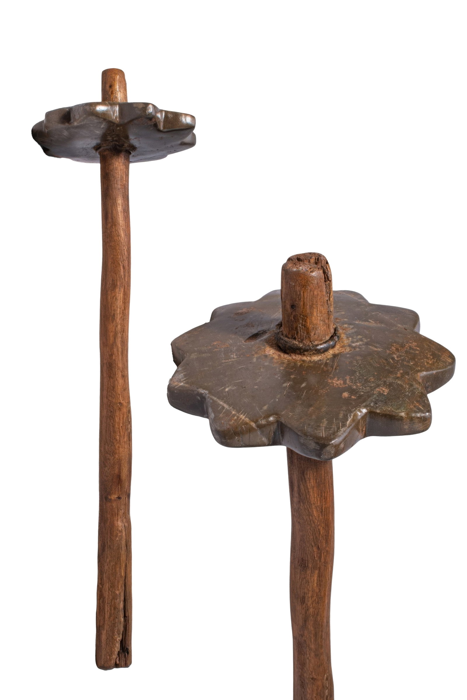 MESOPOTAMIAN STONE AND WOOD STAR-SHAPED MACE: Ca. 1200 - 800 BC. A stone and wood mace with a long tapering shaft and a star-shaped head carved with 10 rounded triangular lobes. The head is pierced through the centre for the shaft and is secured 