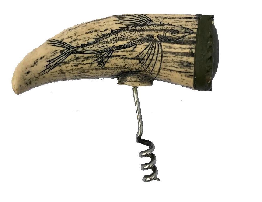 scrimshaw Whale Tooth corkscrew: Replica whale tooth with scrimshaw carving corkscrew. It measures approximately 4" long and is signed J.A.